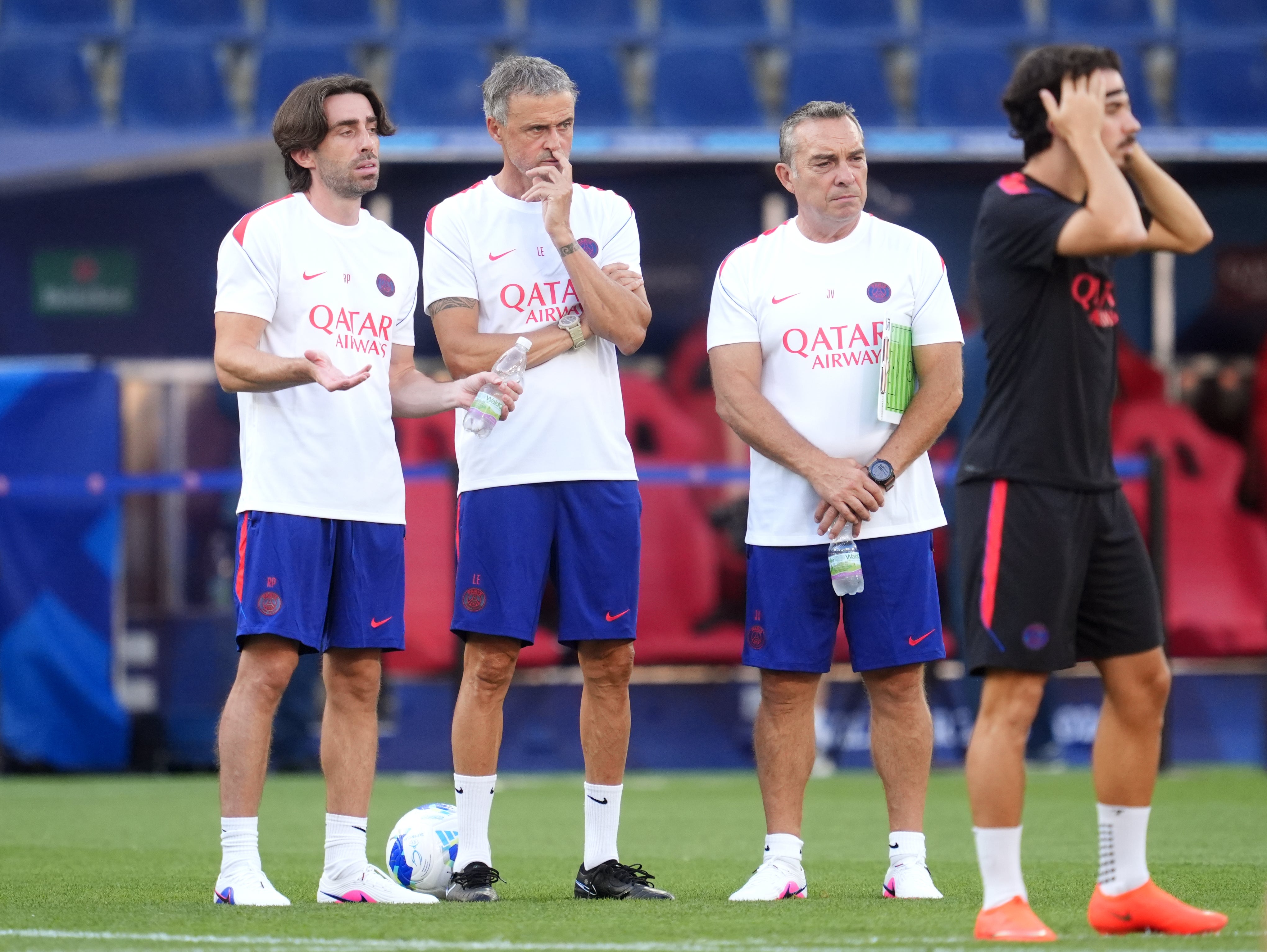Luis Enrique (second left) was unwilling to speak about Barcola’s future
