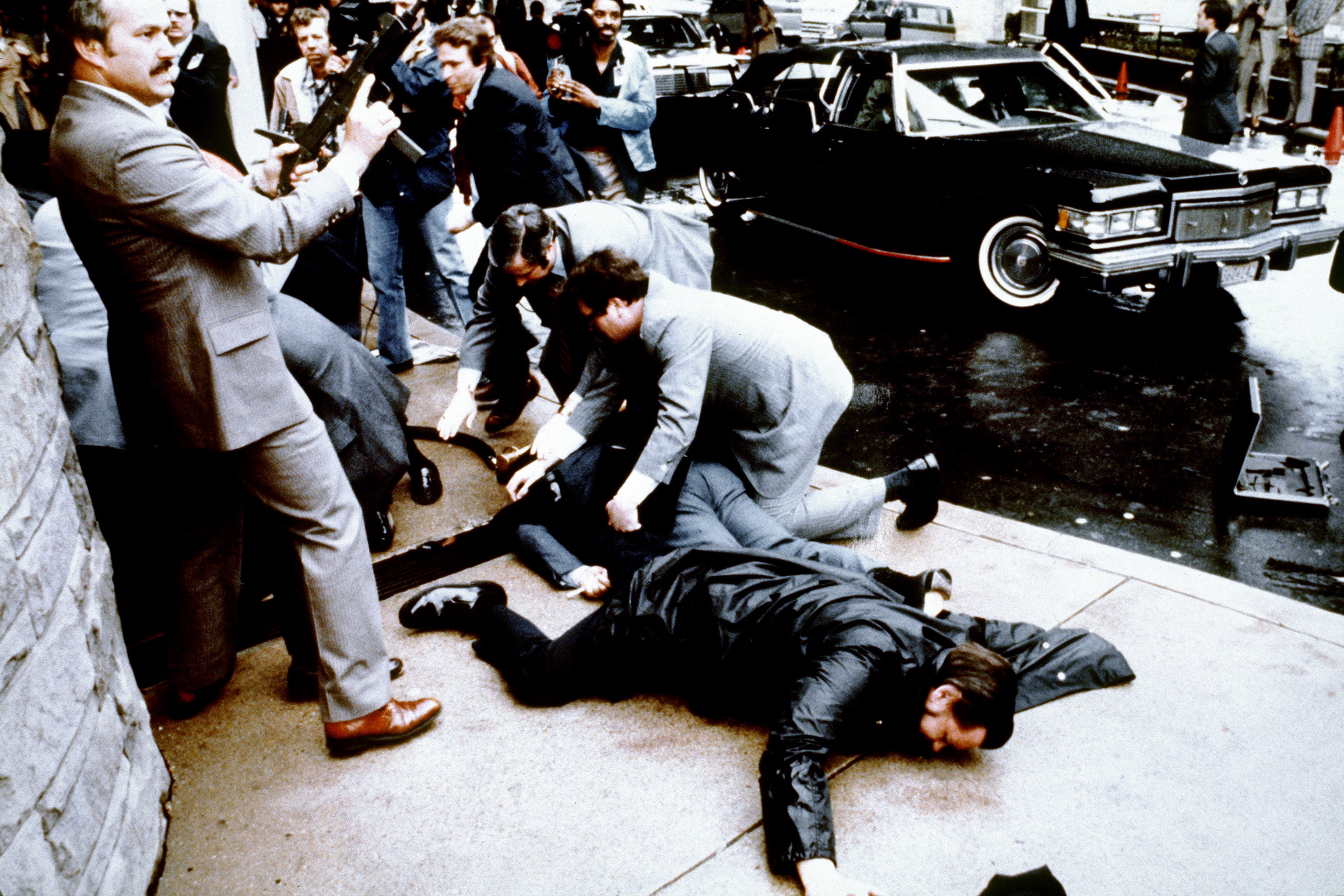 John Hinckley Jr. was tackled to the ground after shooting President Ronald Reagan in Washington, DC, in March 1981 (AFP/Getty)