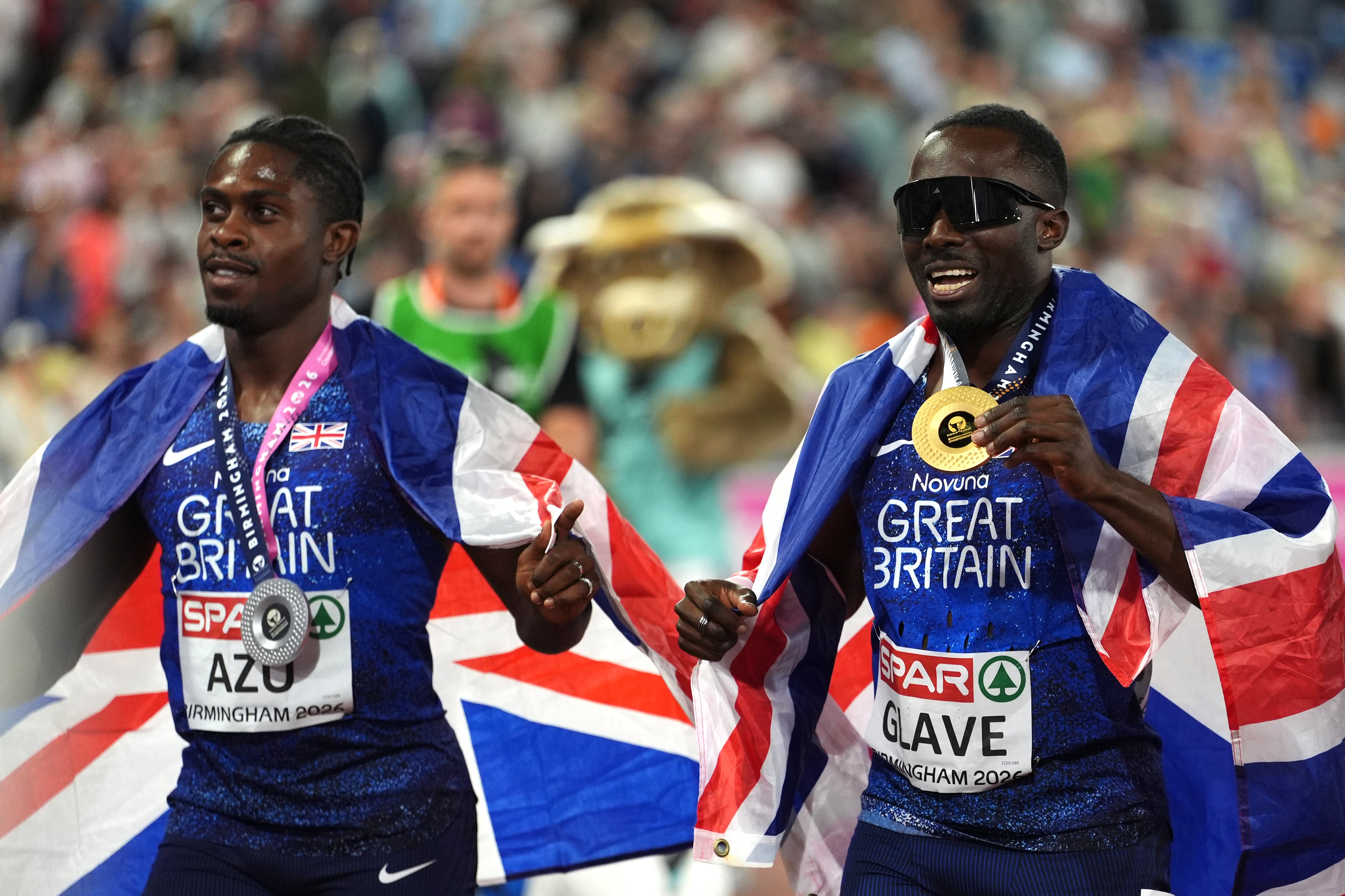 Romell Glave celebrates with Jeremiah Azu (Annabel Lee-Ellis/PA)