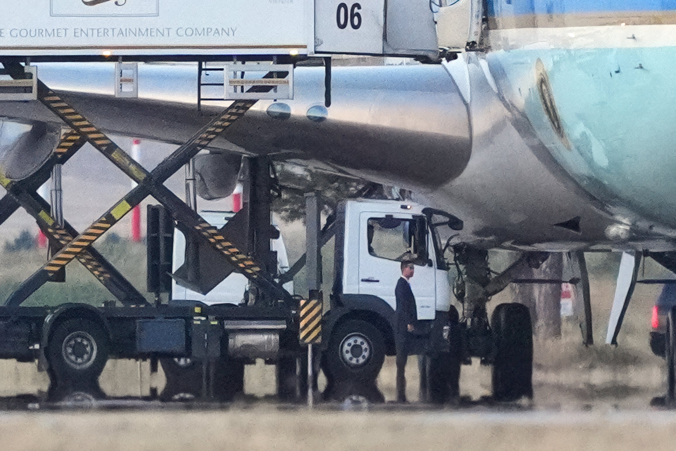 Catering trucks are parked at Air Force One on the tarmac as the motorcade carrying U.S. President Donald Trump arrives to depart following the NATO summit at Ankara International Airport in Ankara, Turkey, Wednesday, July 8, 2026.