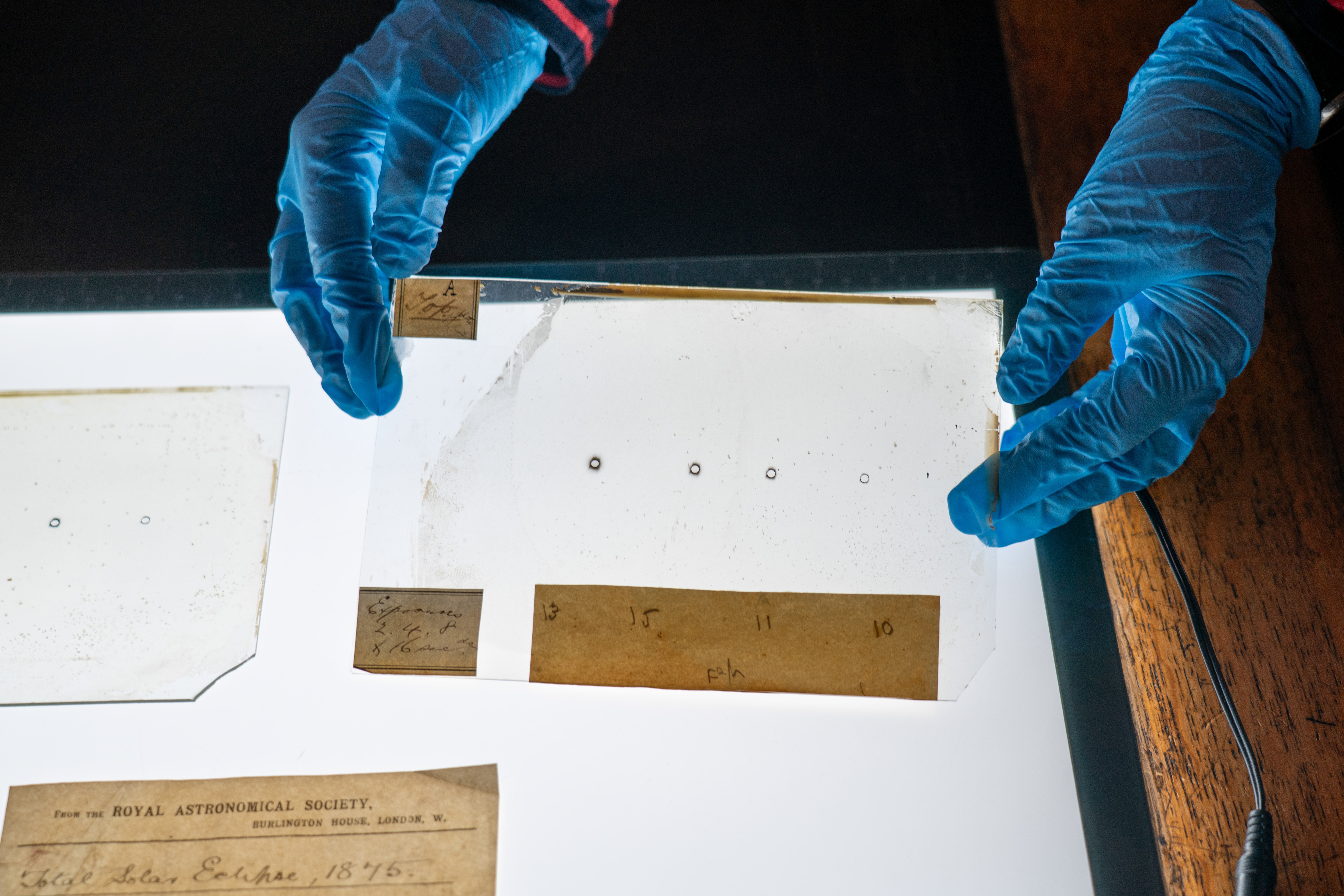 Photographic glass plates taken of a total solar eclipse in 1875 (PA)