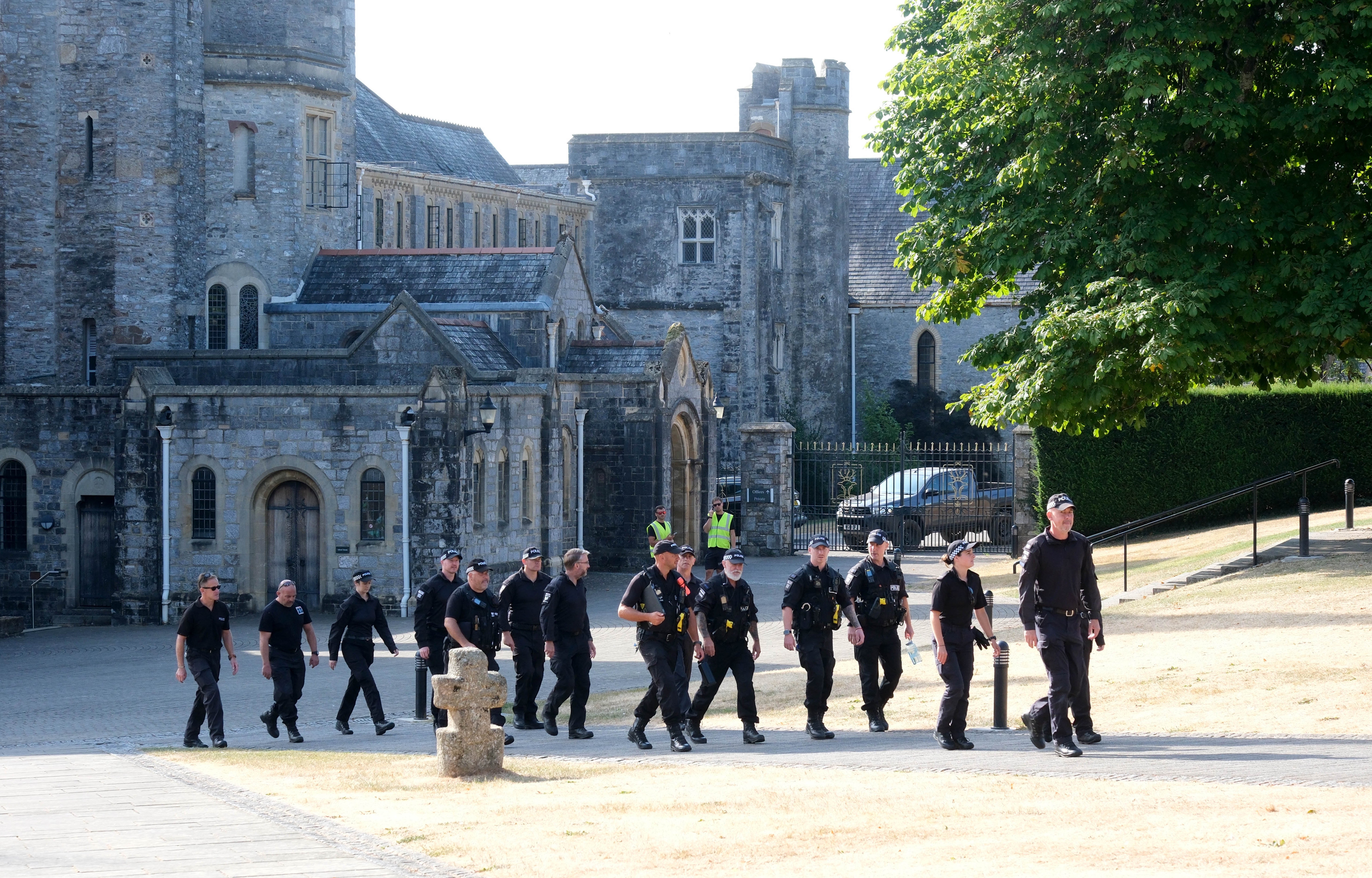 Police patrol Buckfast Abbey ahead of Ann Widdecombe's funeral as family, friends, and peers gather for requiem mass