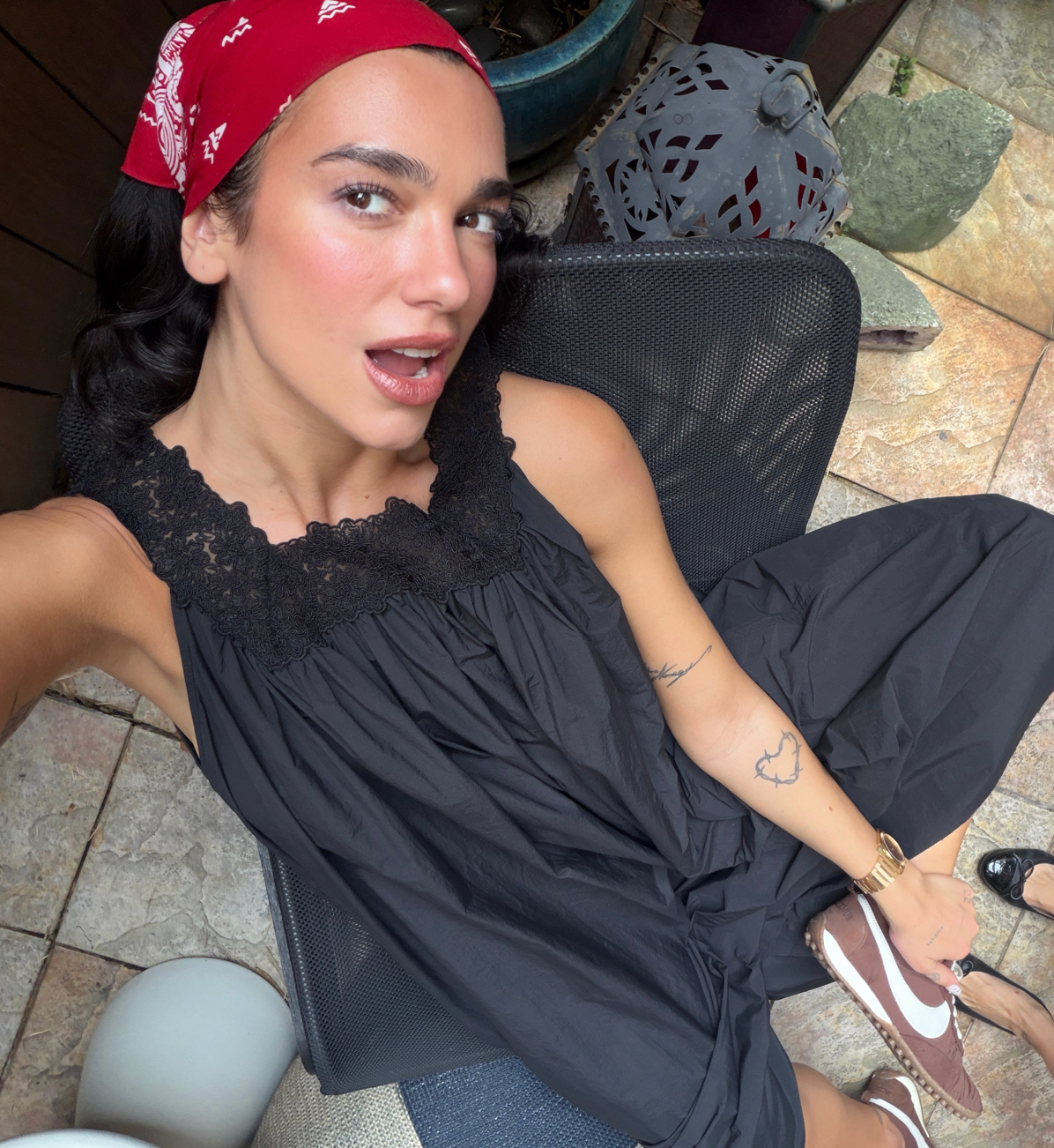Future nostalgia: the throwback look is Dua Lipa’s holiday go-to
