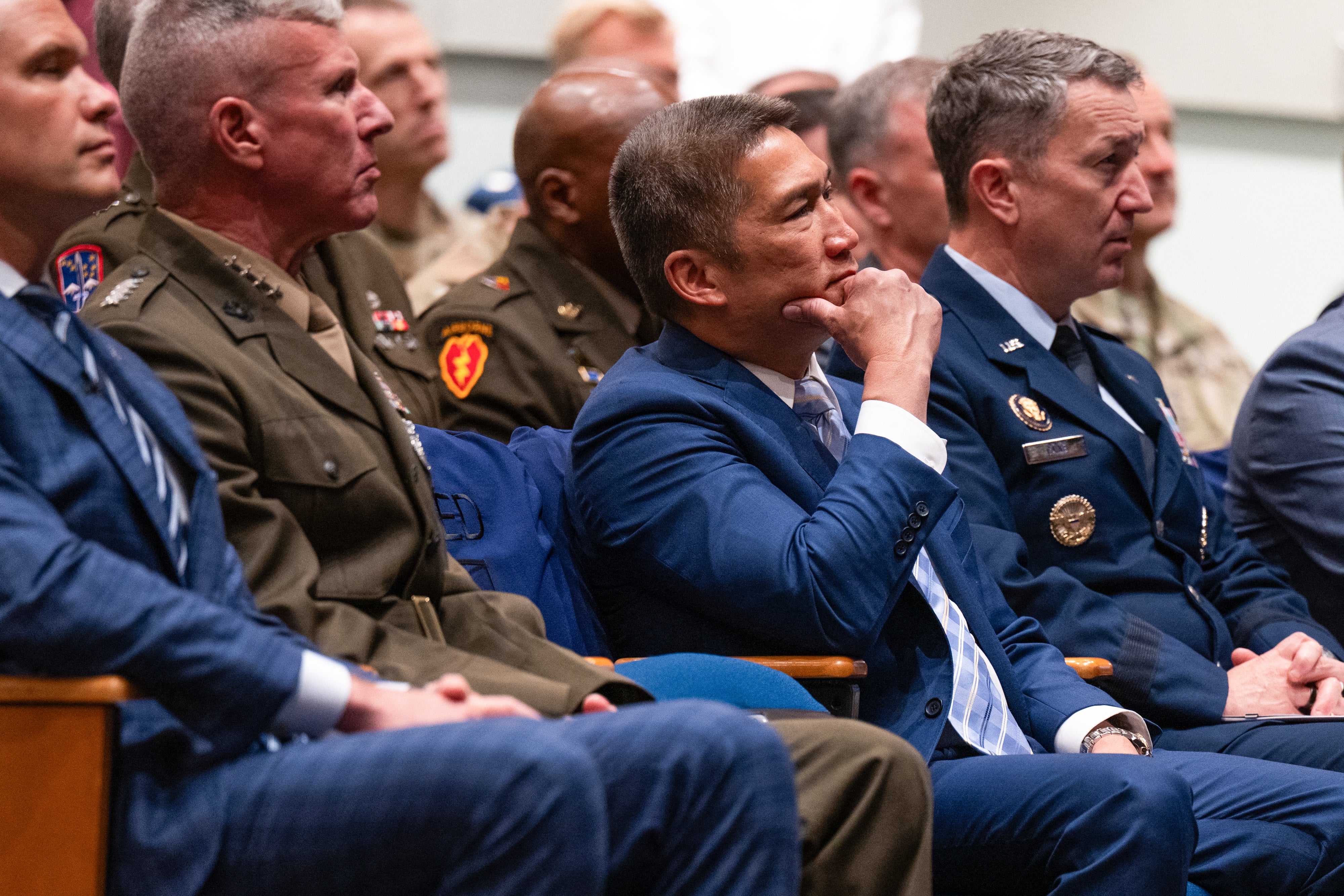 US Acting Secretary of the Navy Hung Cao (center) says that the USS Theodore Roosevelt will be deployed to relieve the USS Abraham Lincoln