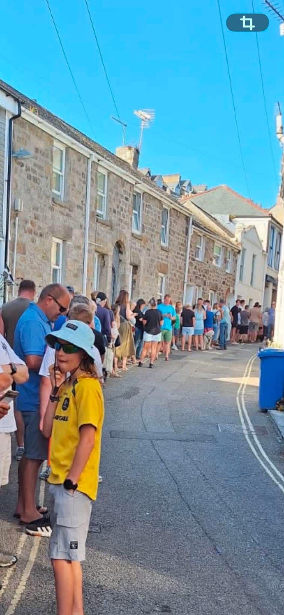A queue for solar eclipse glasses in St Ives, Cornwall, on 12 August, 2026 (Clive Oxley)