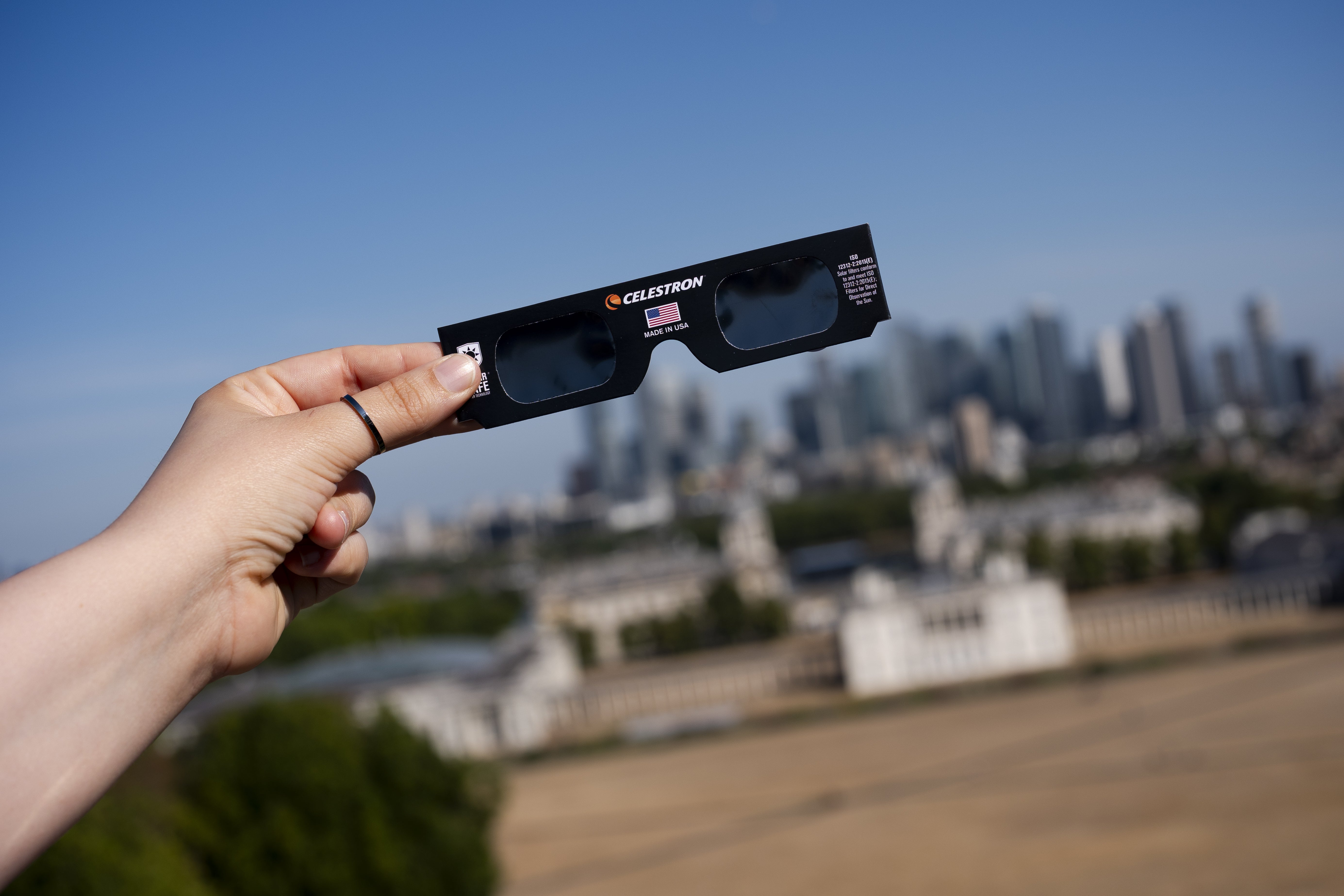 Eclipse glasses are several thousand times darker than sunglasses (Jordan Pettitt/PA)