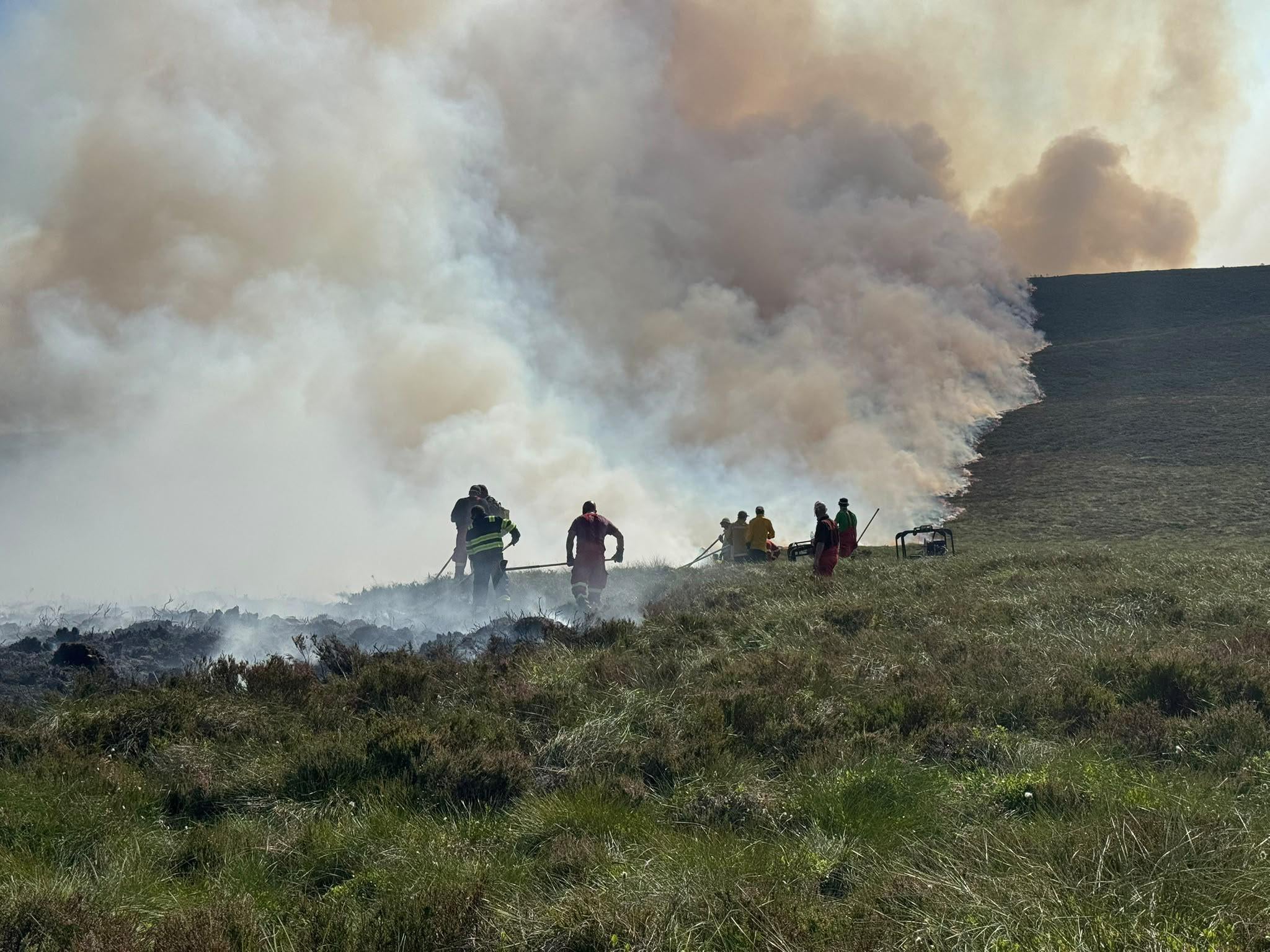 Firefighters tackle a blaze in the Cairngorms national park (RSPB Scotland/PA) (PA Media)