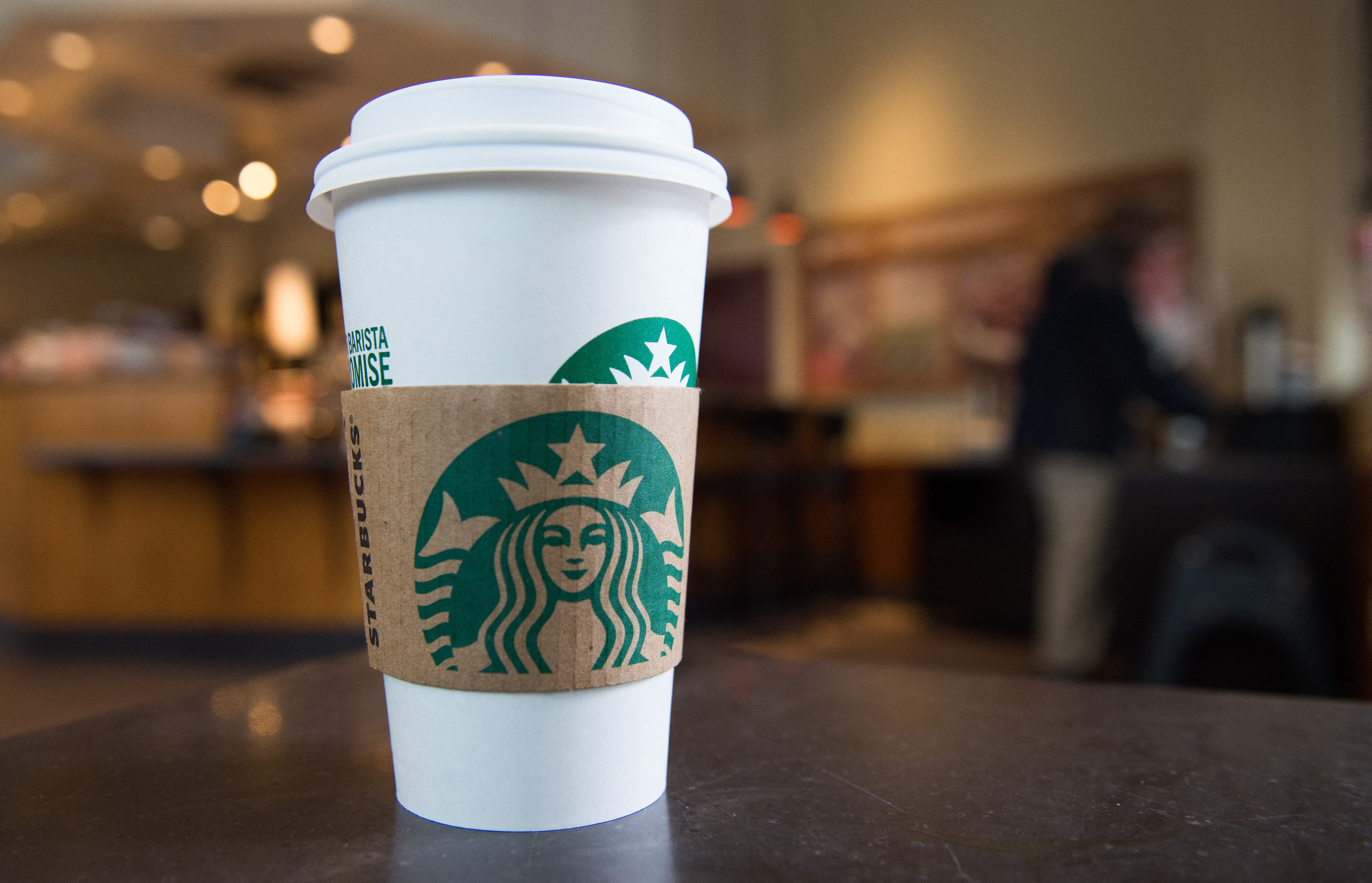 A cup of hot tea and a wobbly table at a Starbucks in San Diego are at the center of a new lawsuit (AFP via Getty Images)
