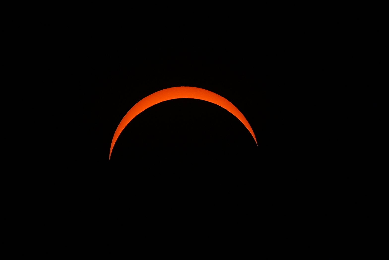 The solar eclipse seen from King's Stairs Gardens in Bermondsey, south London