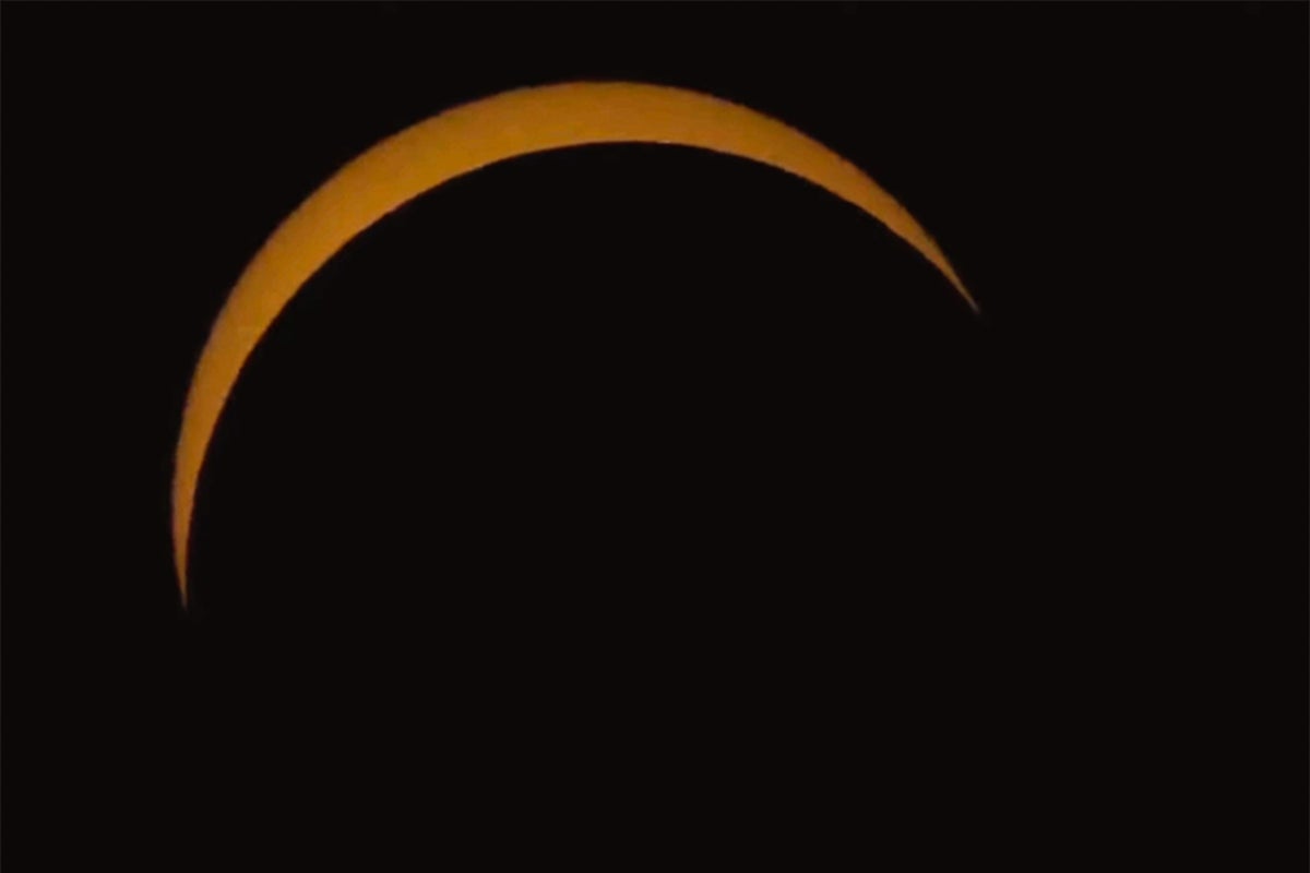 Skywatchers across UK wowed as rare solar eclipse blots out most of the sun