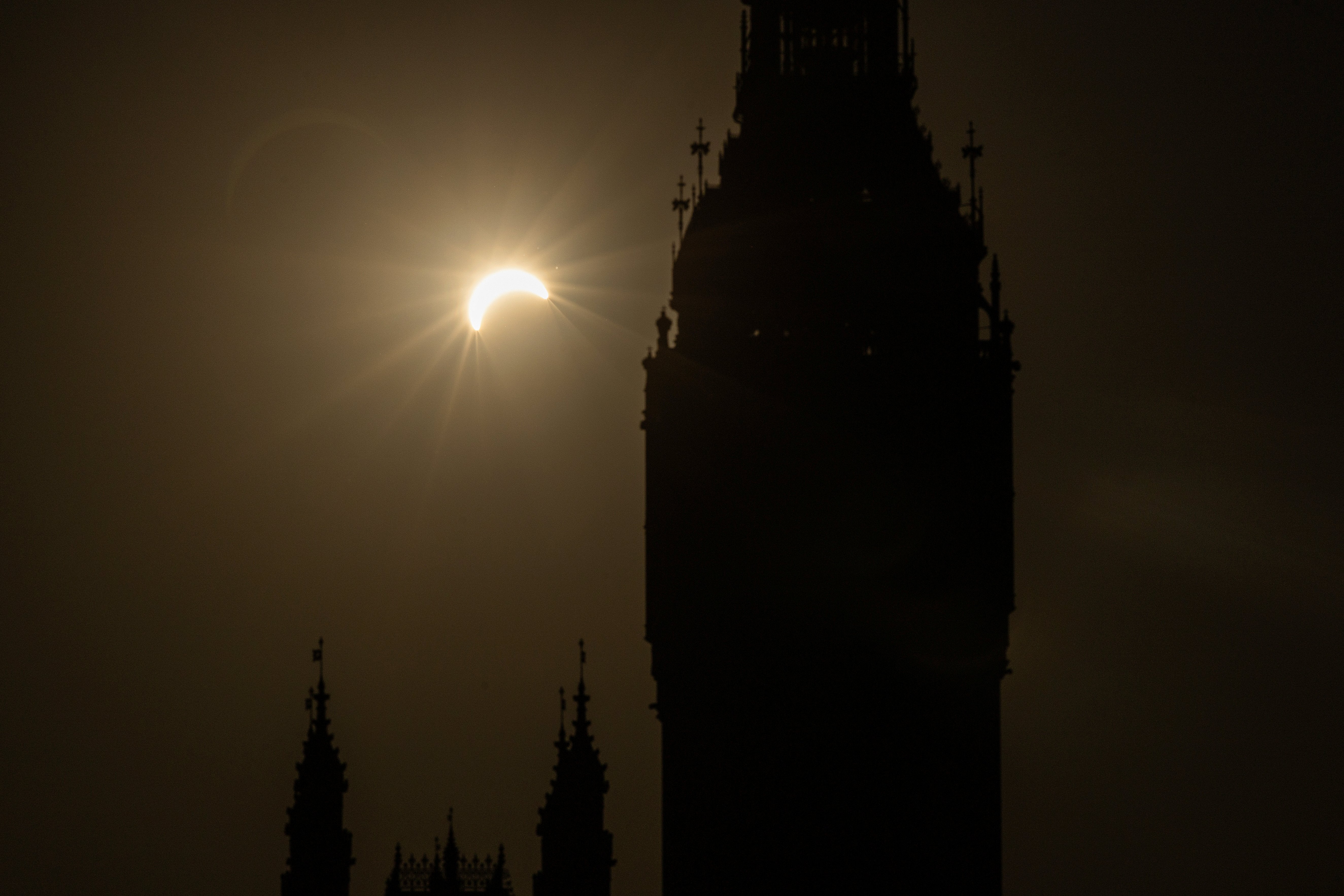 Sun thing special: The eclipse seen beside Big Ben, London (AFP/Getty)