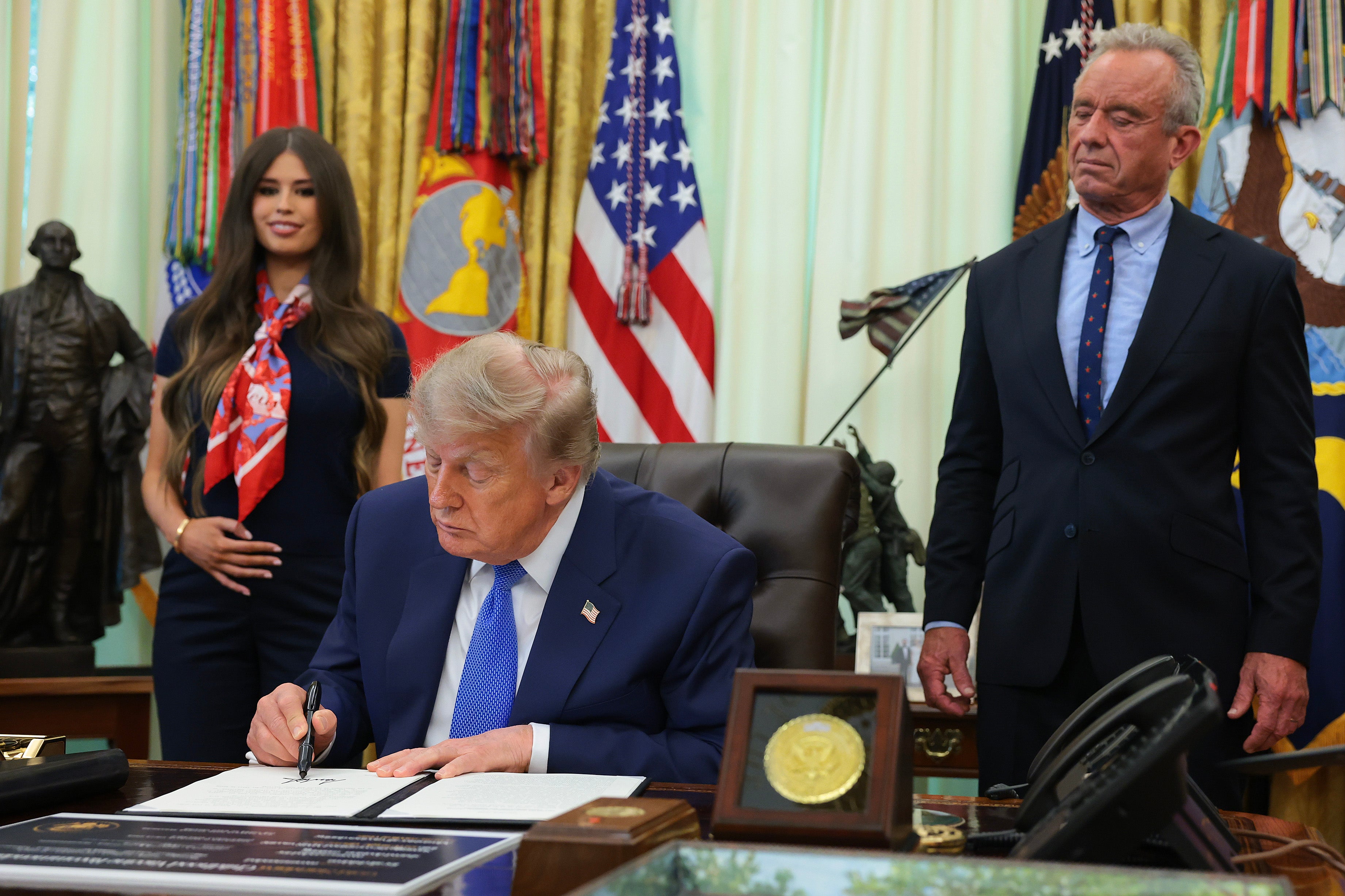 Viral video clips showed Franklin standing behind Trump smiling and nodding her head repeatedly during the announcement