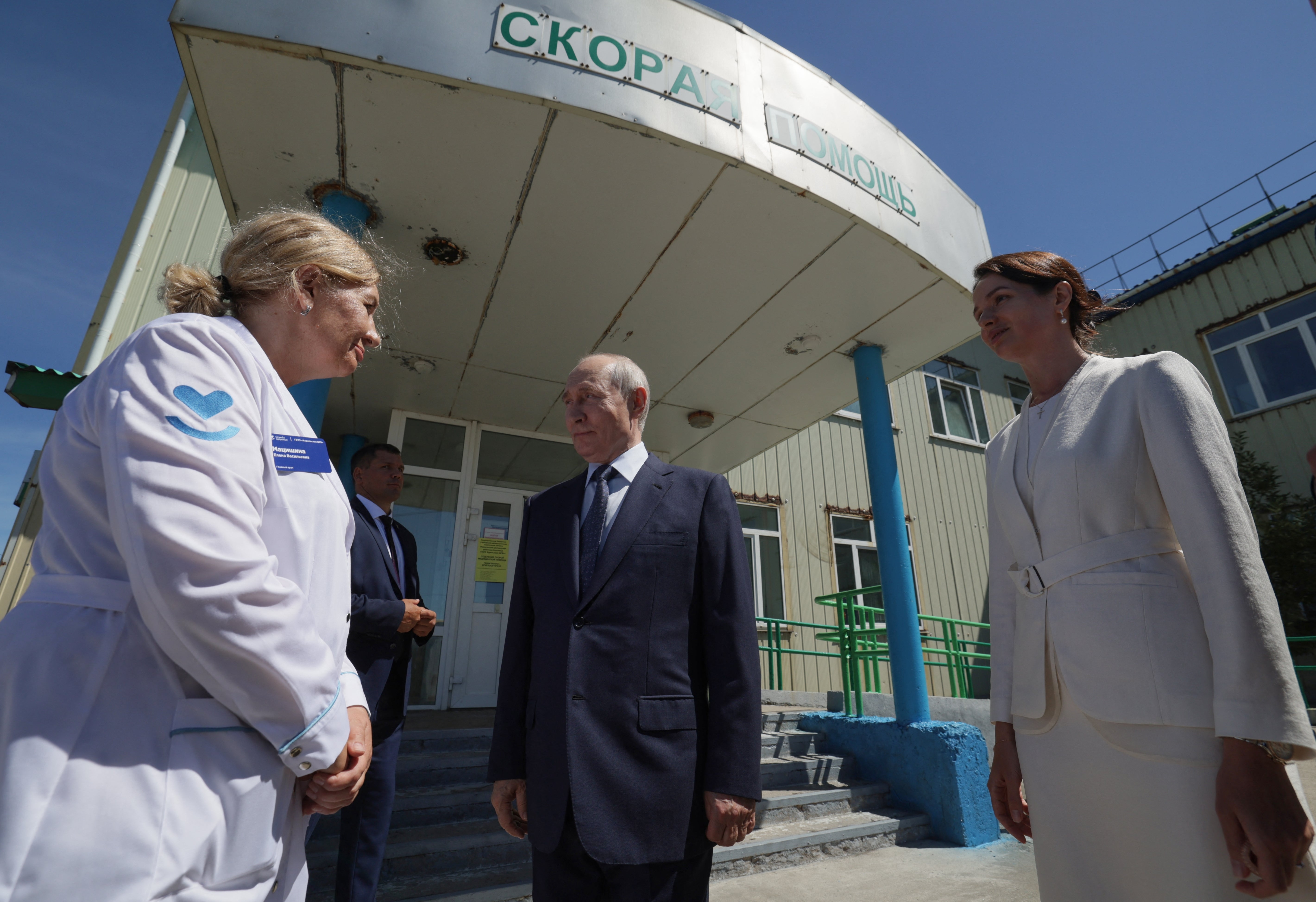 In this pool photograph distributed by the Russian state agency Sputnik, Russia's President Vladimir Putin visits a hospital on Iturup island, one of four islands in the contested chain known as the Kuril Islands in Russia and the Northern Territories in Japan, on 13 August 2026