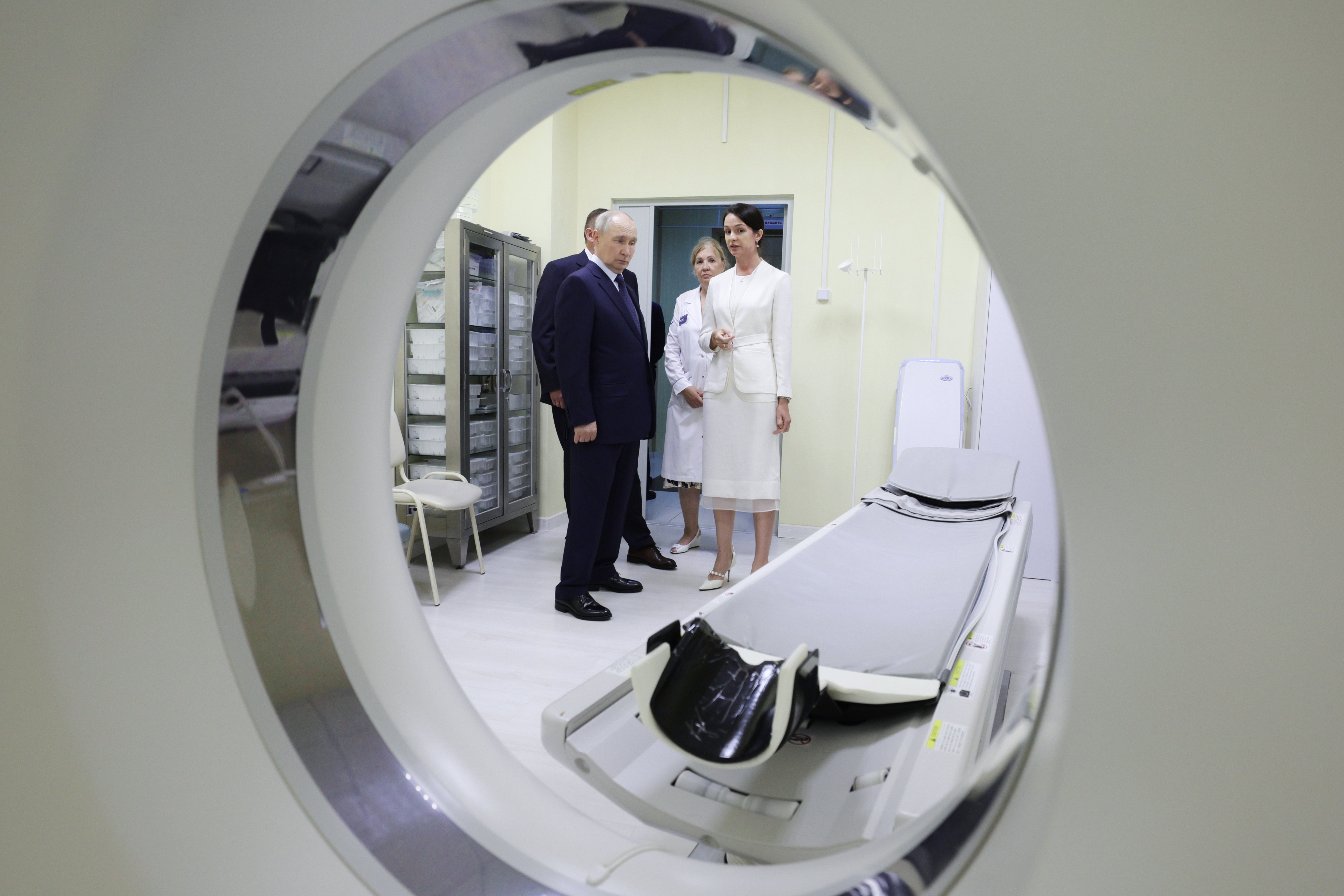 Iturup Island is the largest of the Kuril Islands of Russia's fareast. Putin is pictured here visiting the central district hospital at Kitovoye village on the