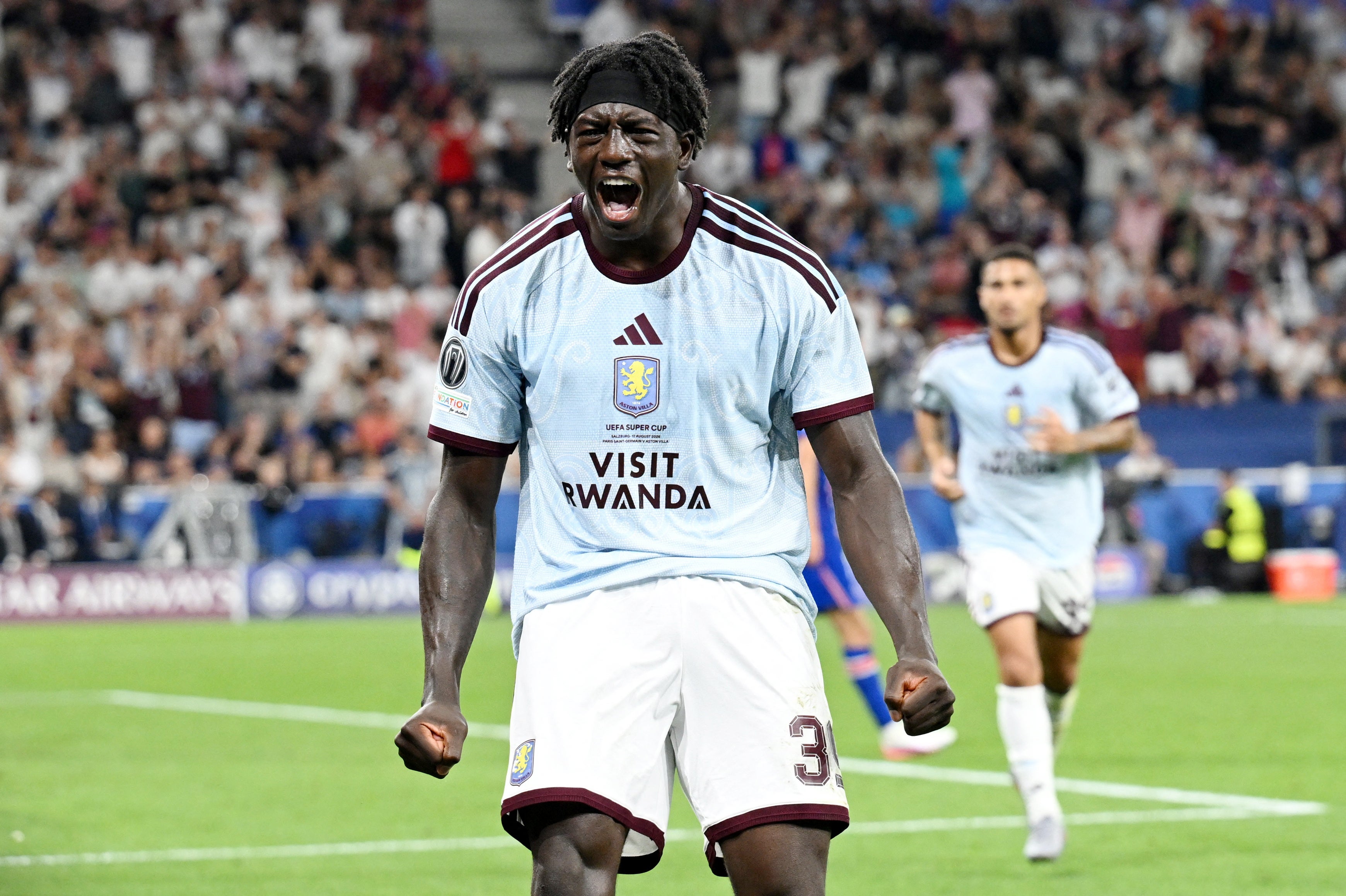 Brian Madjo celebrates after scoring Aston Villa's equaliser in the Super Cup