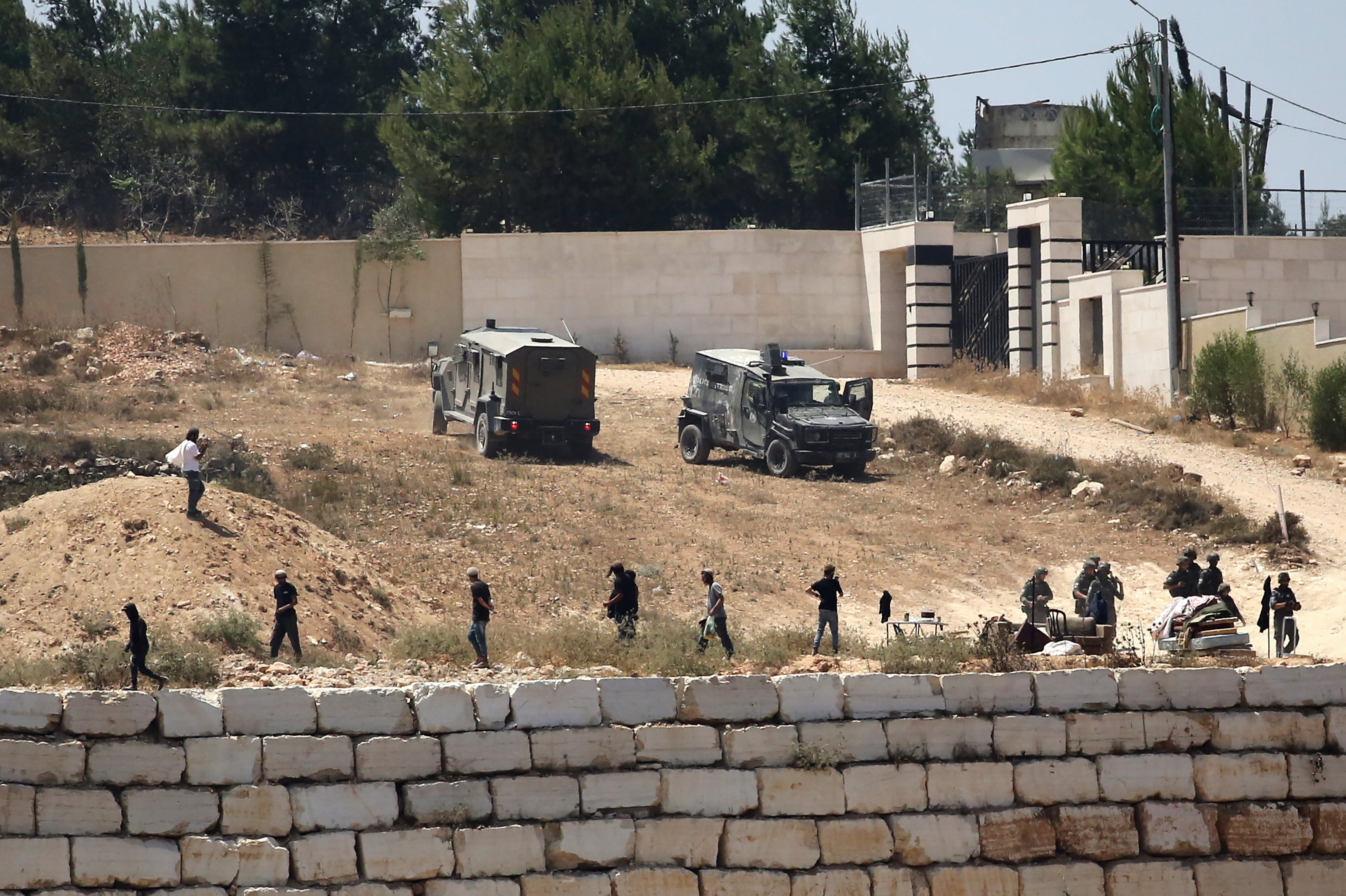 US ambassador calls settler siege of Palestinian homes in West Bank a 'horrific act of terror'; Israeli military evacuates two, dismantles outposts