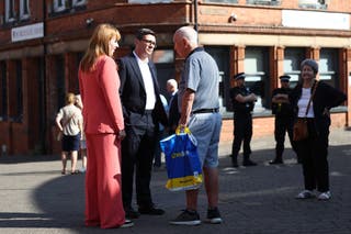 Prime Minister Andy Burnham, centre, revealed plans earlier this week to give councils more powers to stop betting shops opening in local communities (Toby Shepheard/PA)