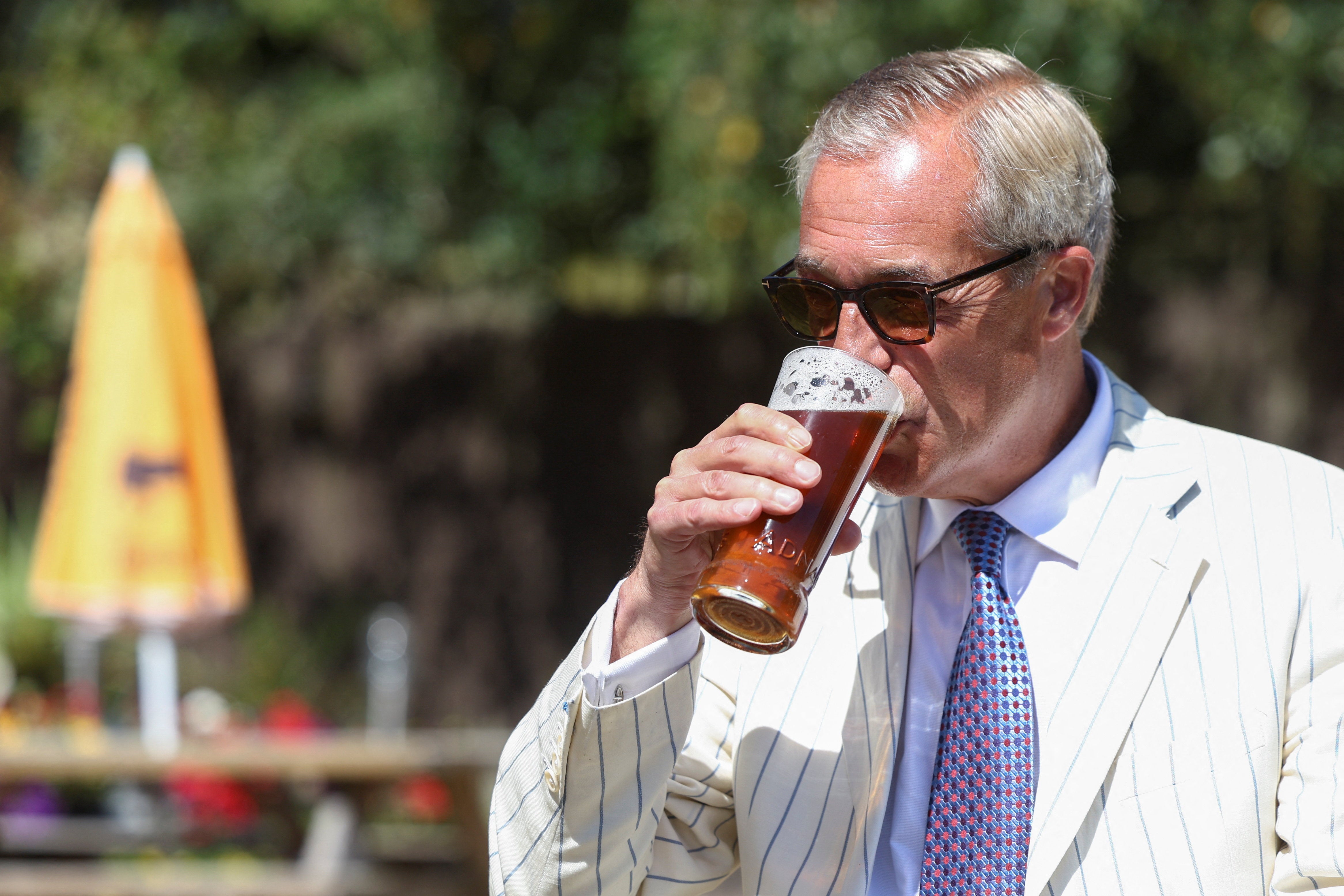 Britain's Reform UK party leader Nigel Farage visits The Ship, on the day of voting in the Clacton by-election, triggered by his own resignation (Reuters)