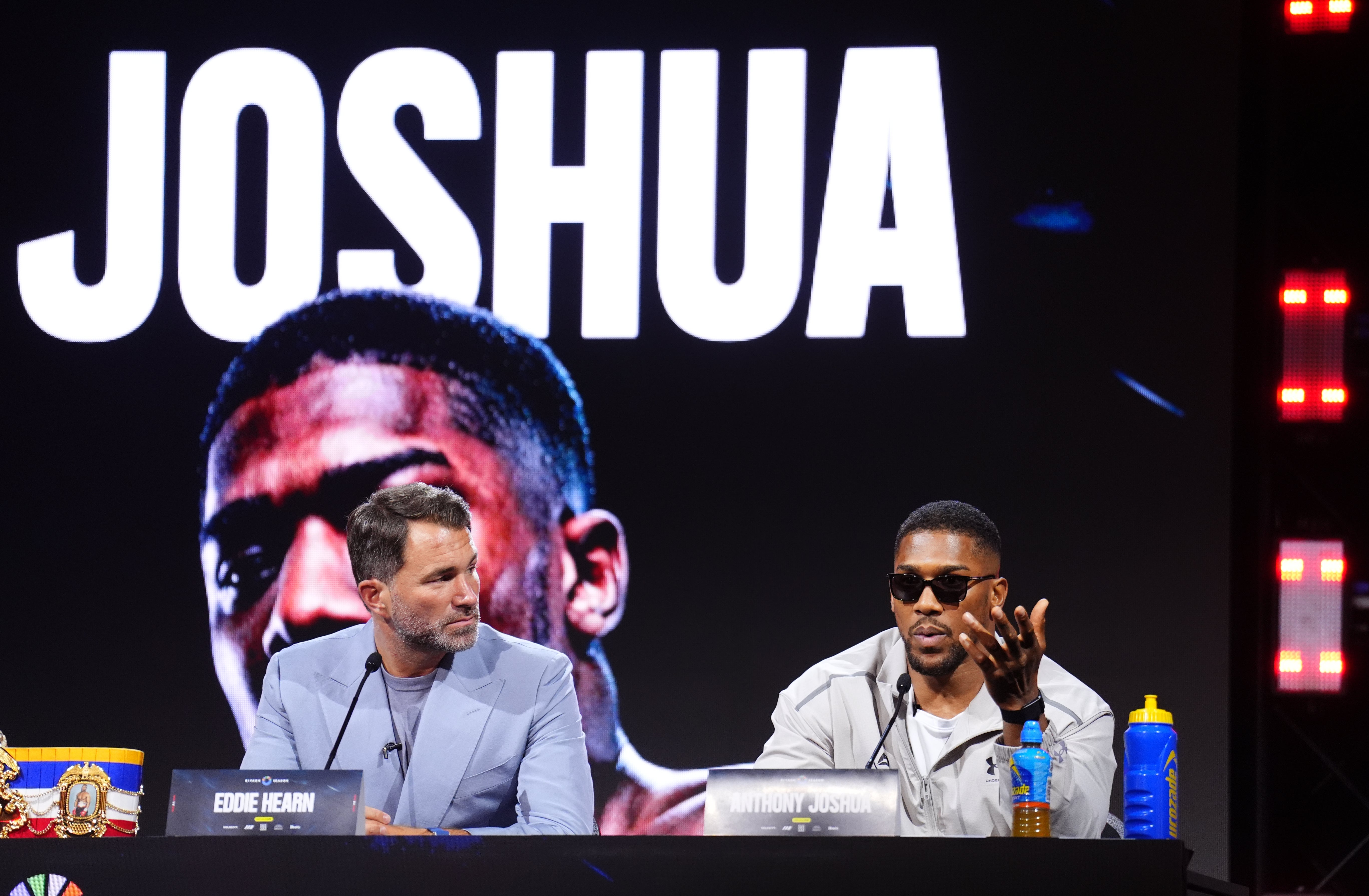 Eddie Hearn (left) and Anthony Joshua want the Tyson Fury fight to take place in the UK (John Walton/PA)