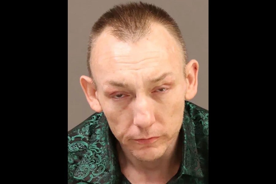 Eugene Horsch, 44, remains in federal custody facing weapons and fraudulent credential charges, while police pore over evidence seized from the home he shared with his late father (Philadelphia Police Department)