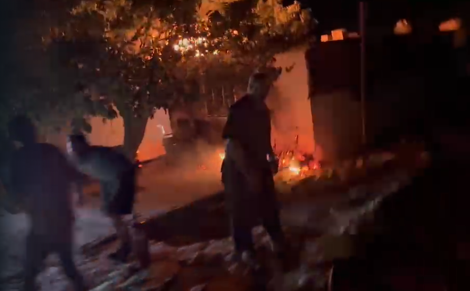 Residents rushed to put out the fires following the attack on Wednesday 5 August