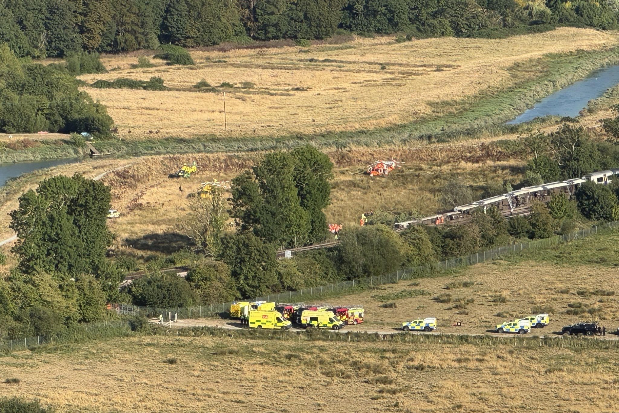 Emergency services worked from an adjacent field