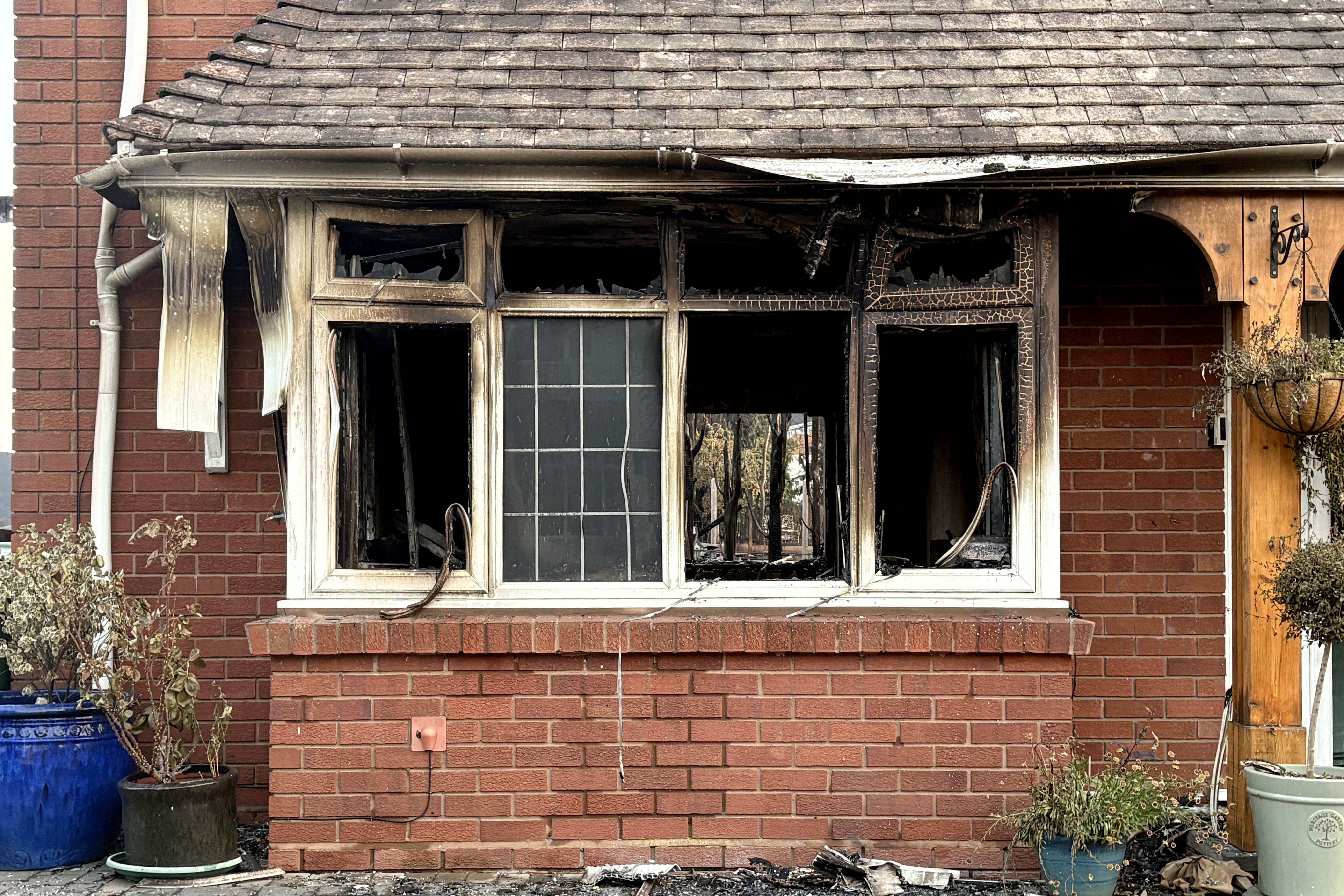 A burnt-out property on Racecourse Lane, Stourbridge