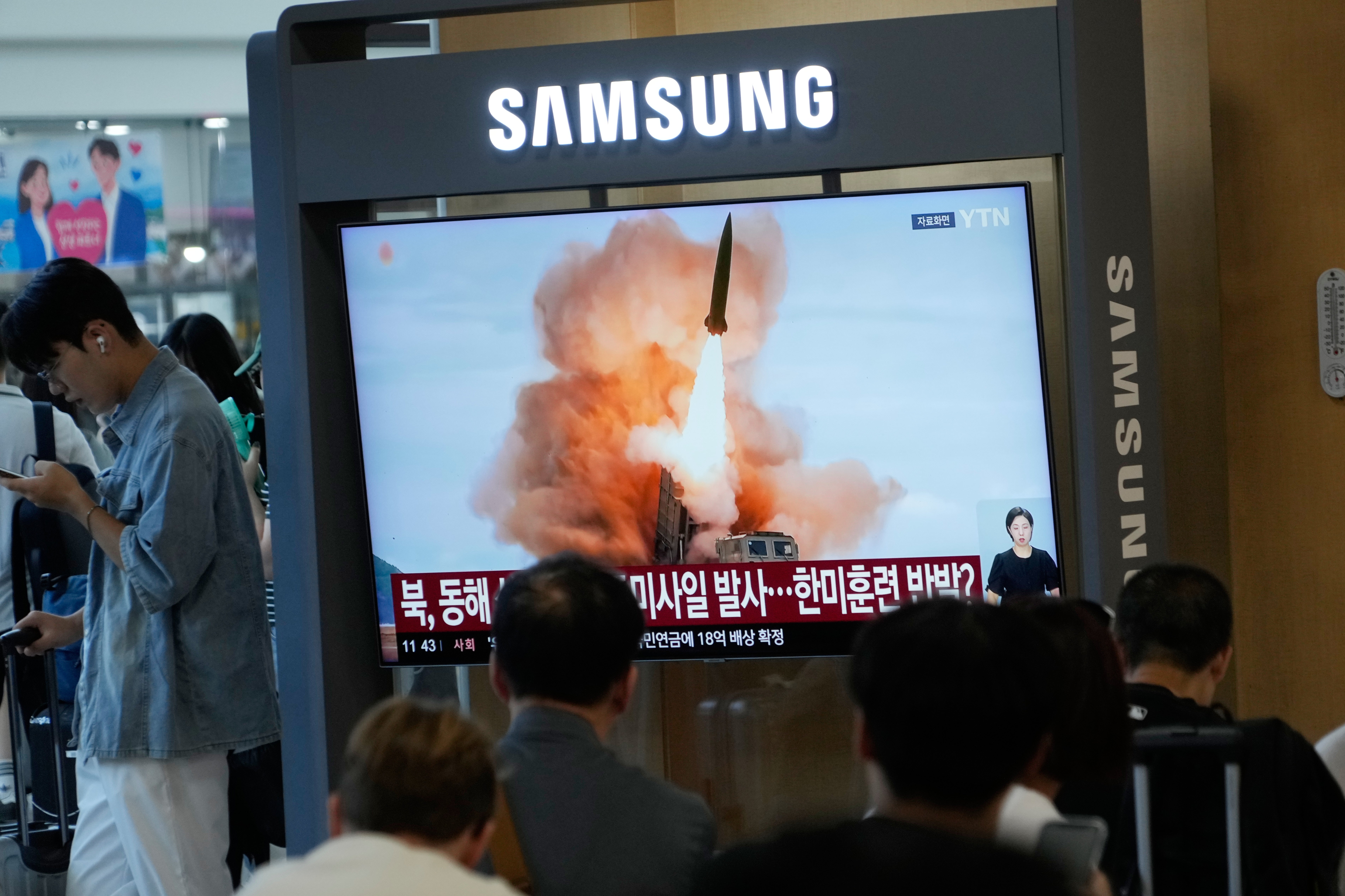 A TV screen at the Seoul railway station in Seoul, South Korea, shows a North Korean missile launch