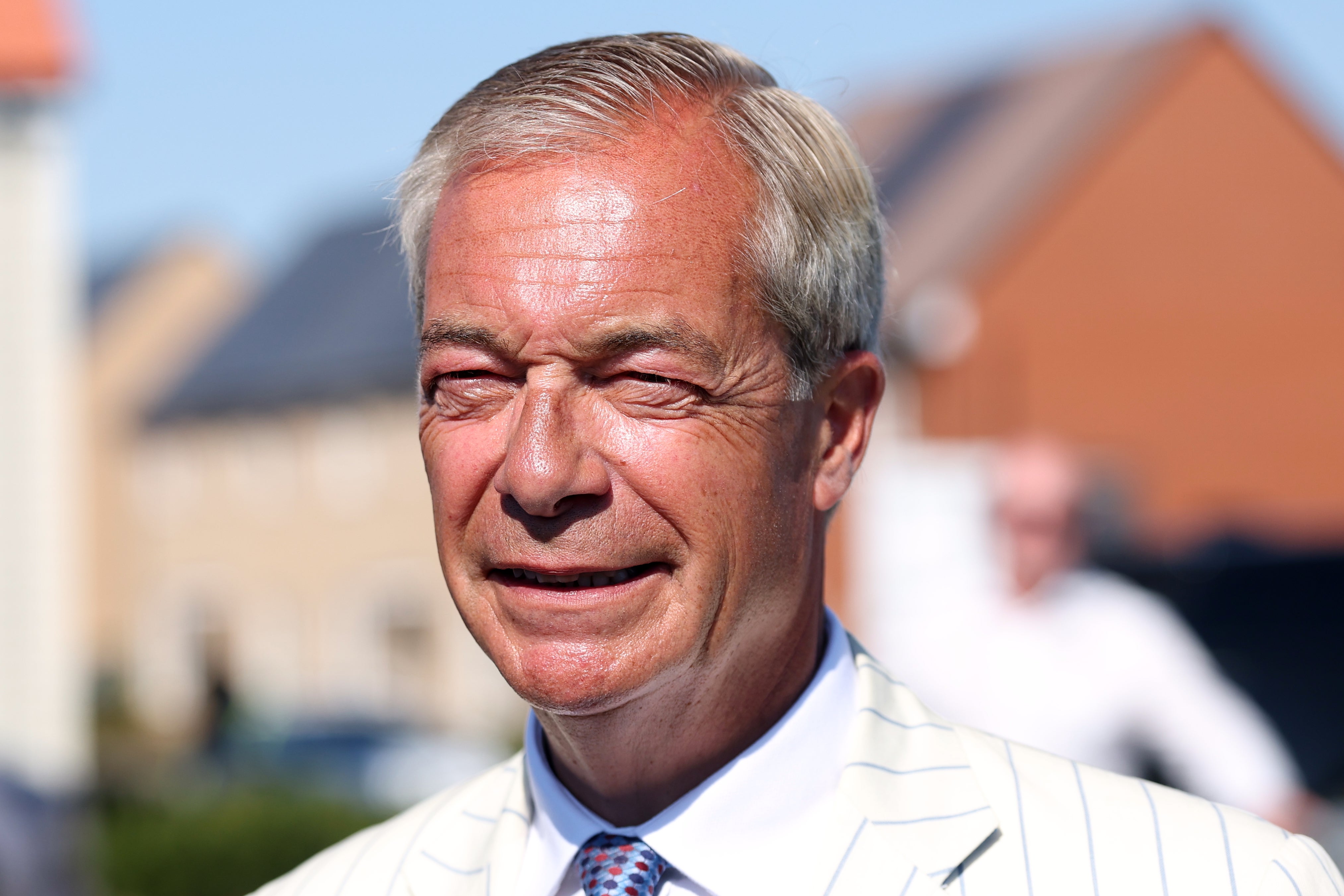 Nigel Farage retains seat in Clacton by-election but refuses to attend result due to &lsquo;threats&rsquo;