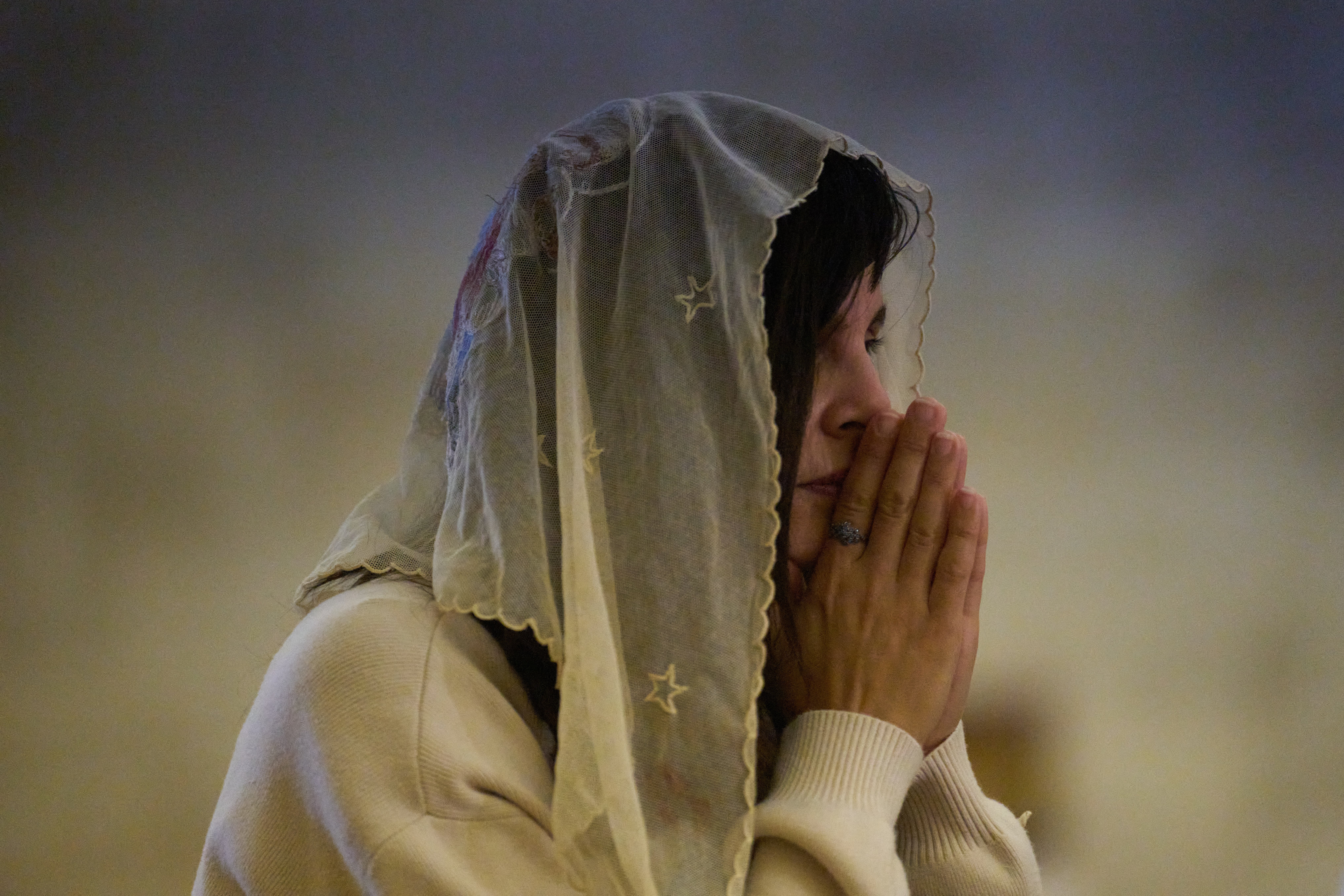 A Christian pilgrim attends a Mass in the Basilica of the Transfiguration on Mount Tabor, northern Israel, Aug. 6, 2026. (AP Photo/Ariel Schalit) (Copyright 2026 The Associated Press. All rights reserved)
