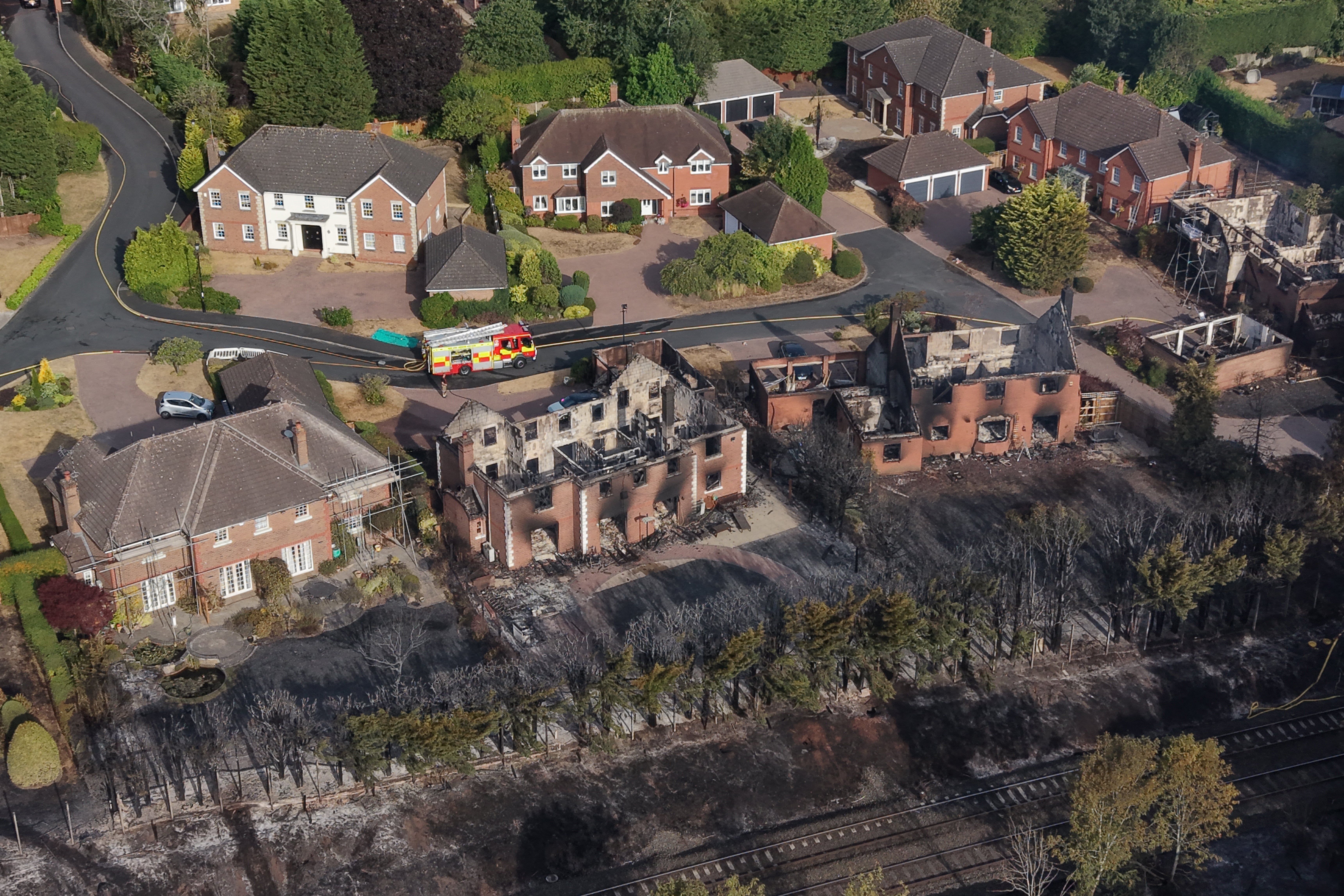 Specialist fire investigators from West Midlands Fire Service, working alongside colleagues from West Midlands Police, have established that farming equipment was being used in the vicinity of both fields immediately before the fires were first reported, the fire service said. (AFP/Getty)