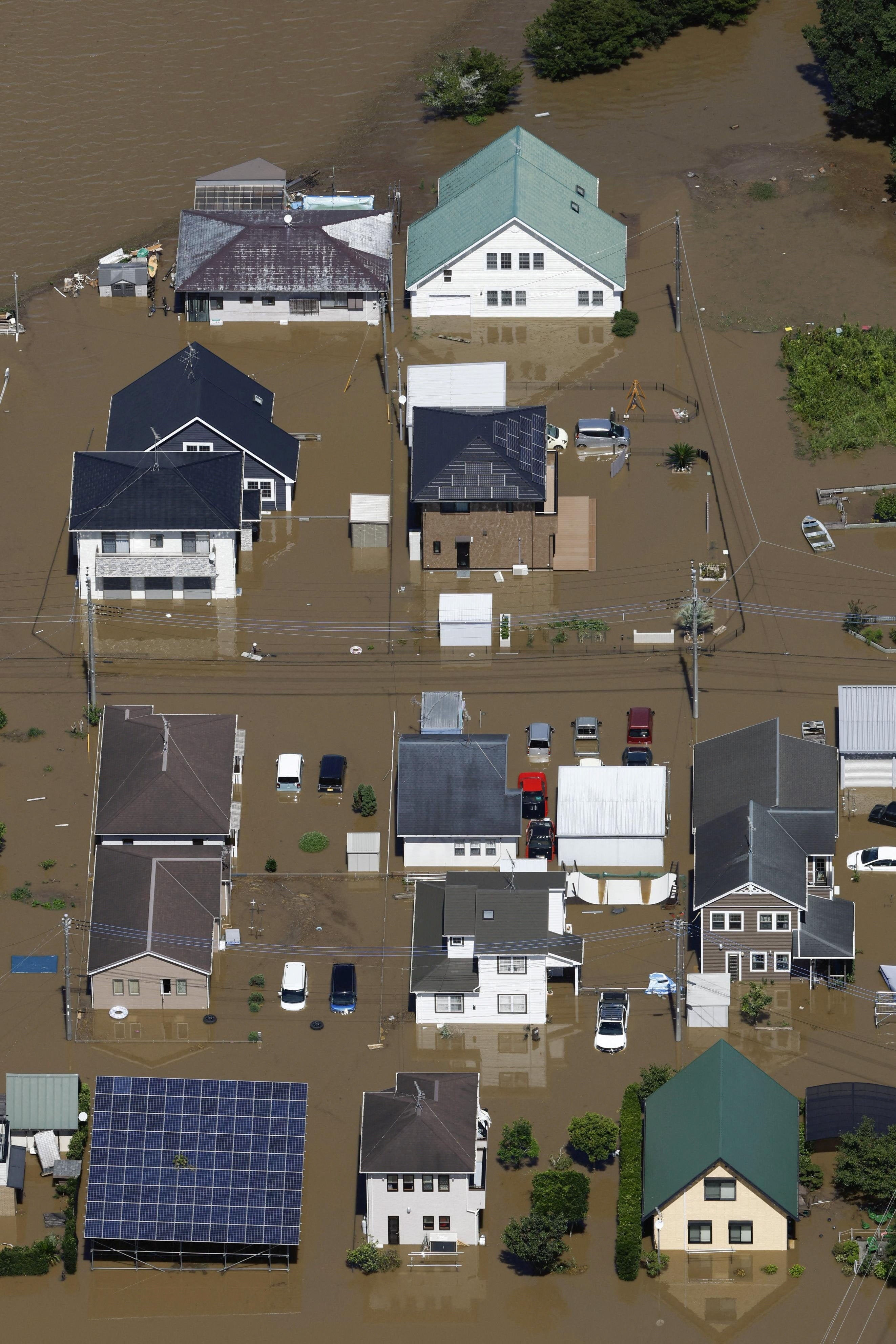 An aerial view of a flooded area after heavy rain in Oamishirasato, Chiba prefecture, Japan (Reuters)