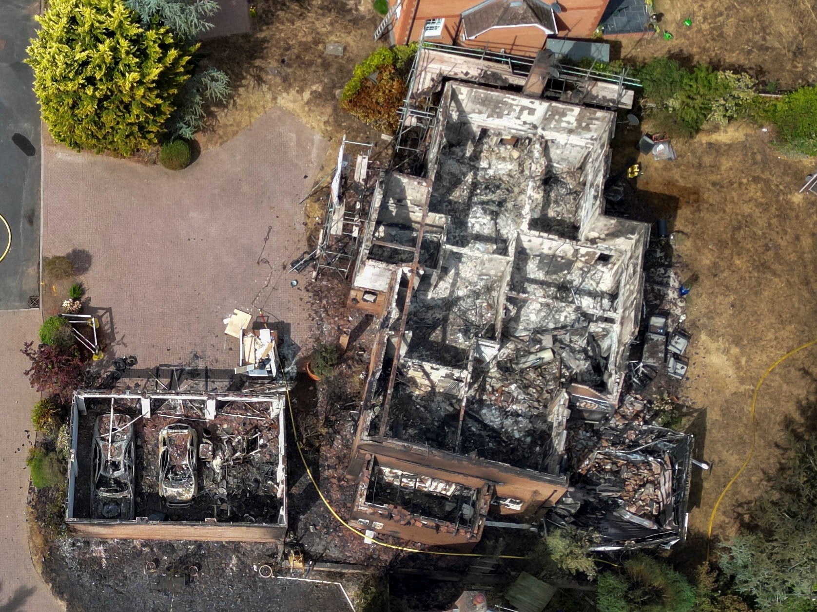 A drone view of a burnt out house in the West Midlands