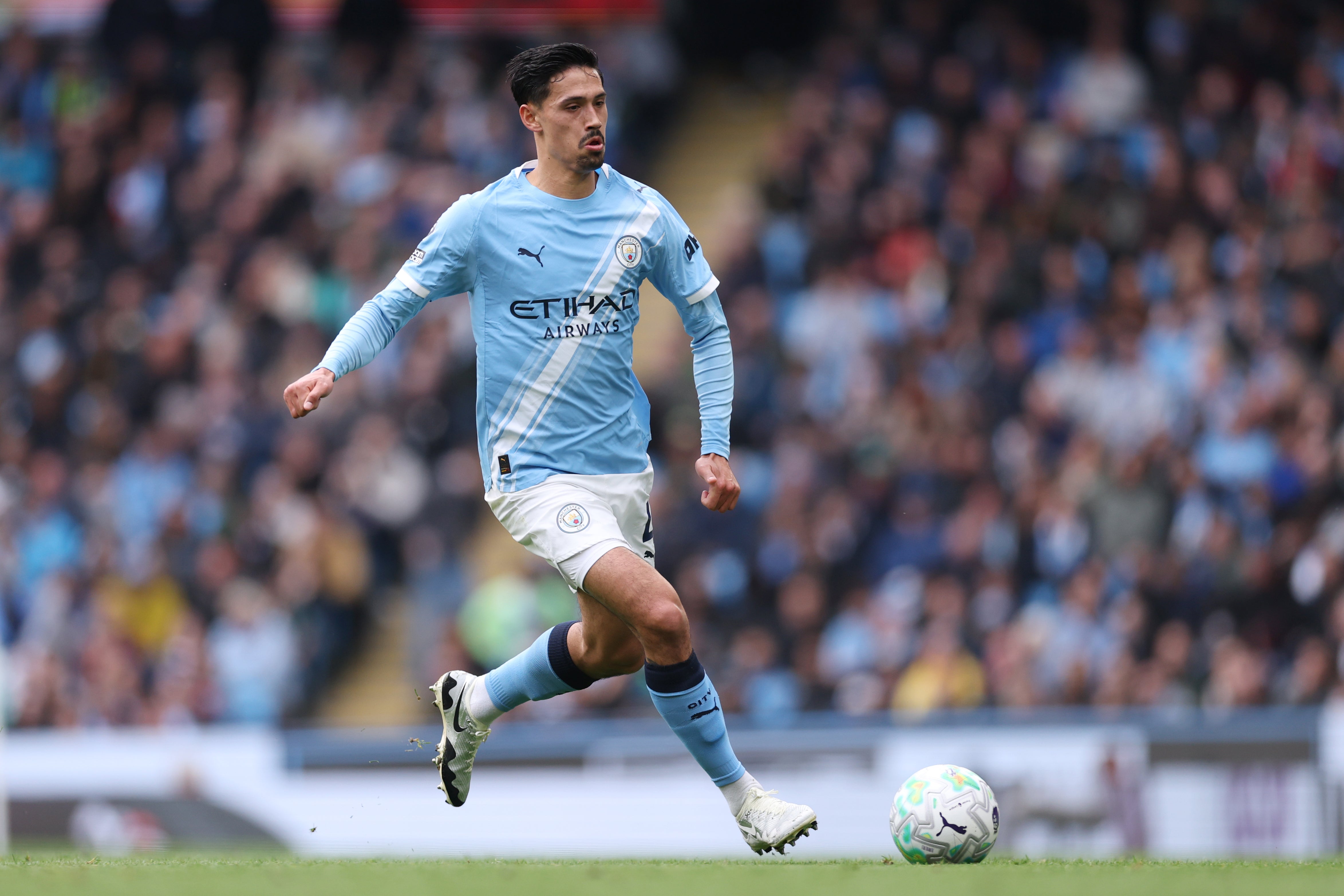 Tijjani Reijnders on the ball for Manchester City