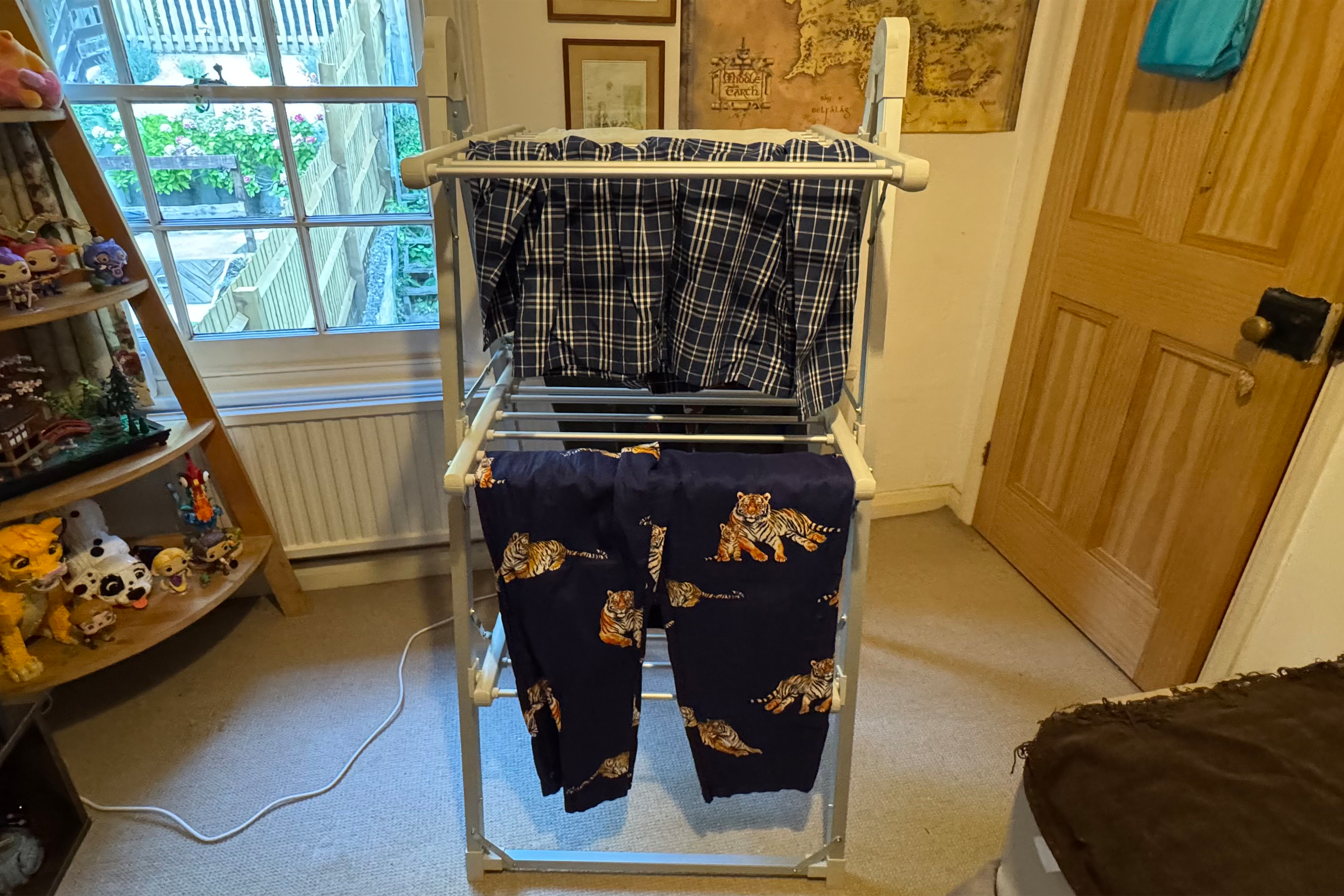This has a section for drying shoes and socks (Jo Plumridge/The Independent)