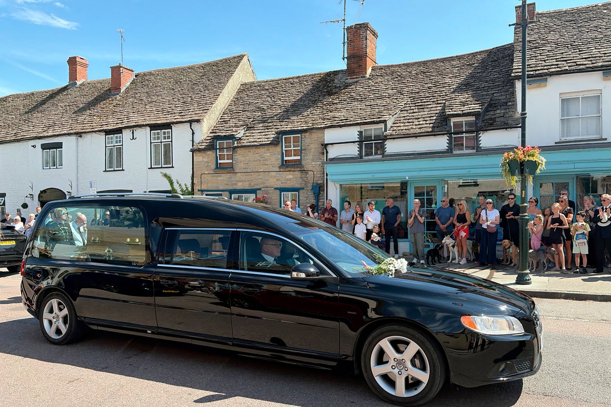Crowds and animals pay emotional farewell to beloved pet shop owner killed in head-on crash