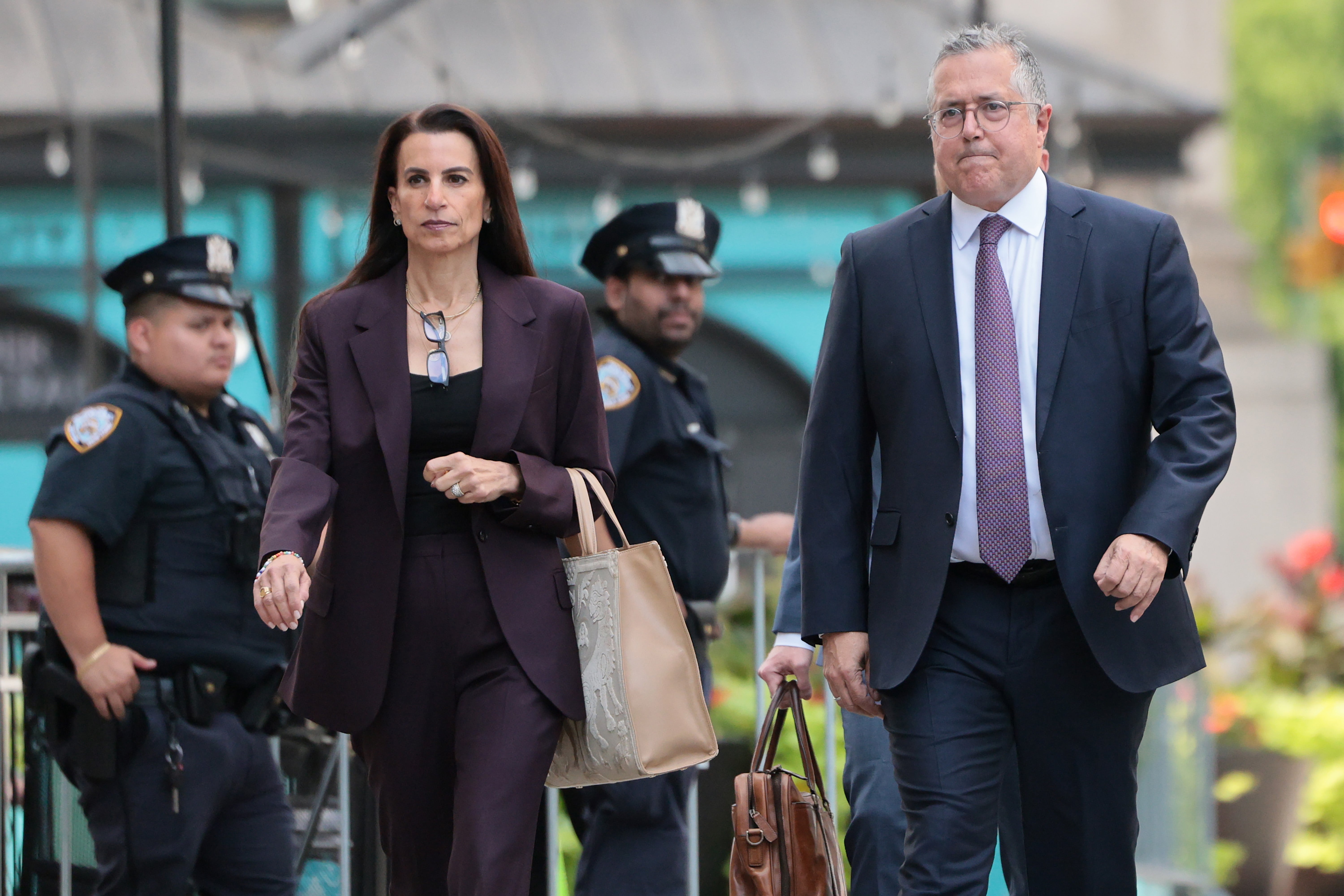 Mangione’s lawyers Karen Friedman Agnifilo and Marc Agnifilo arrived in federal court August 14 after unexpectedly requesting a pretrial hearing, where Mangione pleaded guilty to federal charges of stalking resulting in death. They are seeking to block his state trial from moving forward on double jeopardy grounds