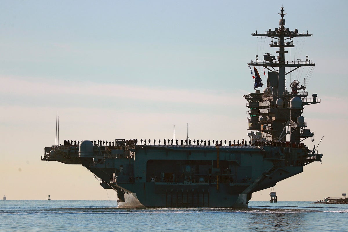 US top Middle East commander visits deployed aircraft carrier, and other Mideast news