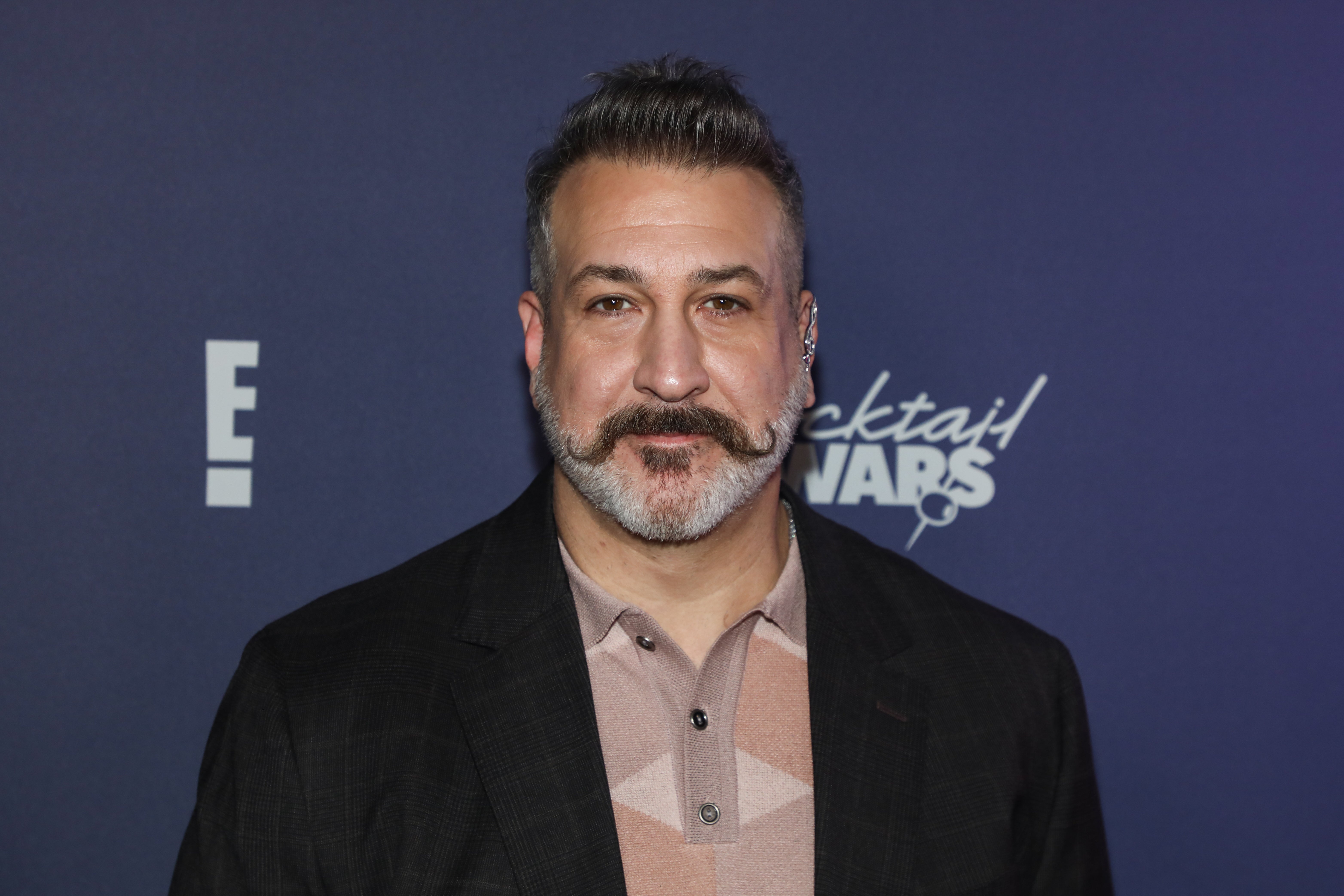 Joey Fatone admitted he and his former NSYNC bandmates are not on the same page in their personal lives (AP)
