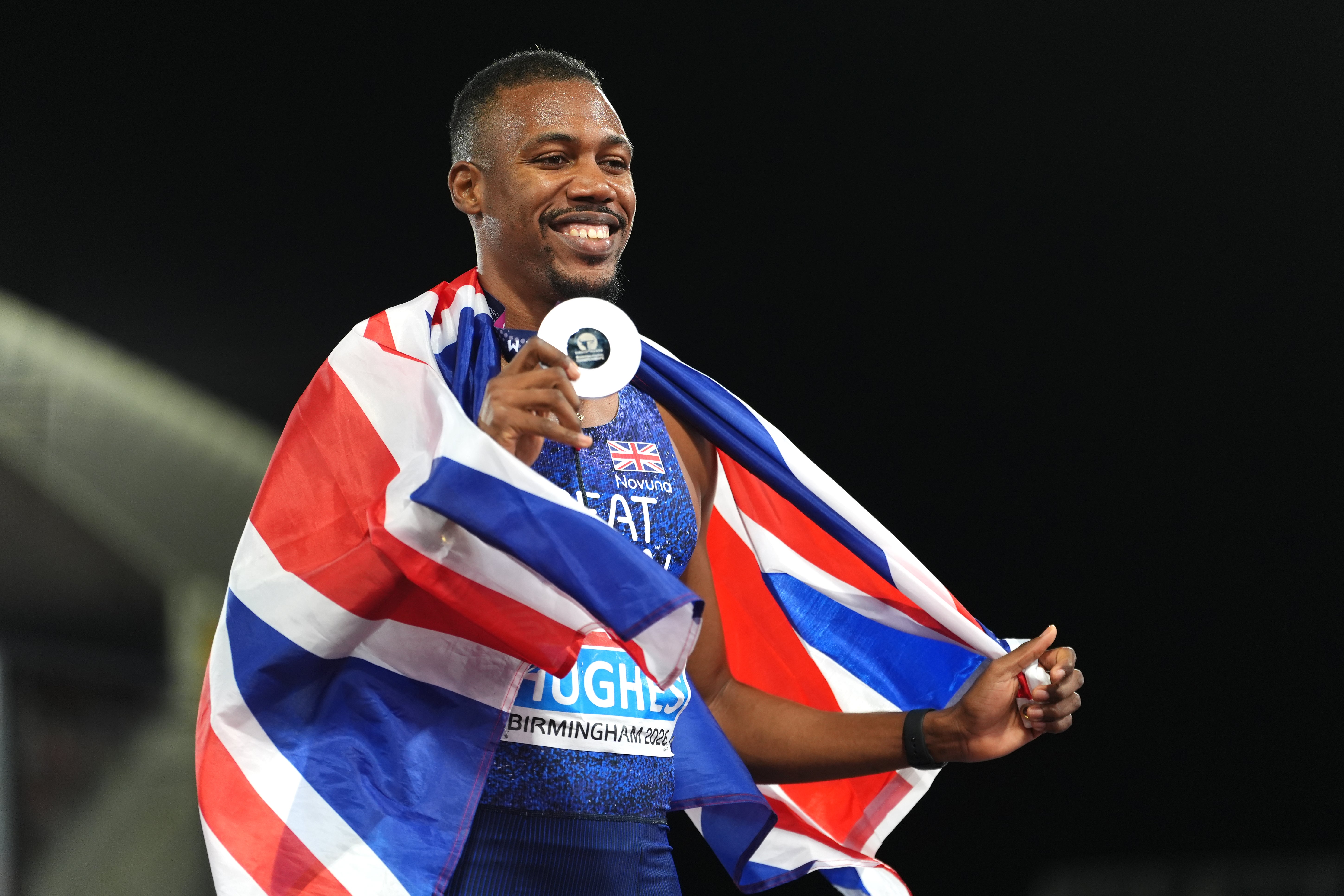 Hughes accepted his silver