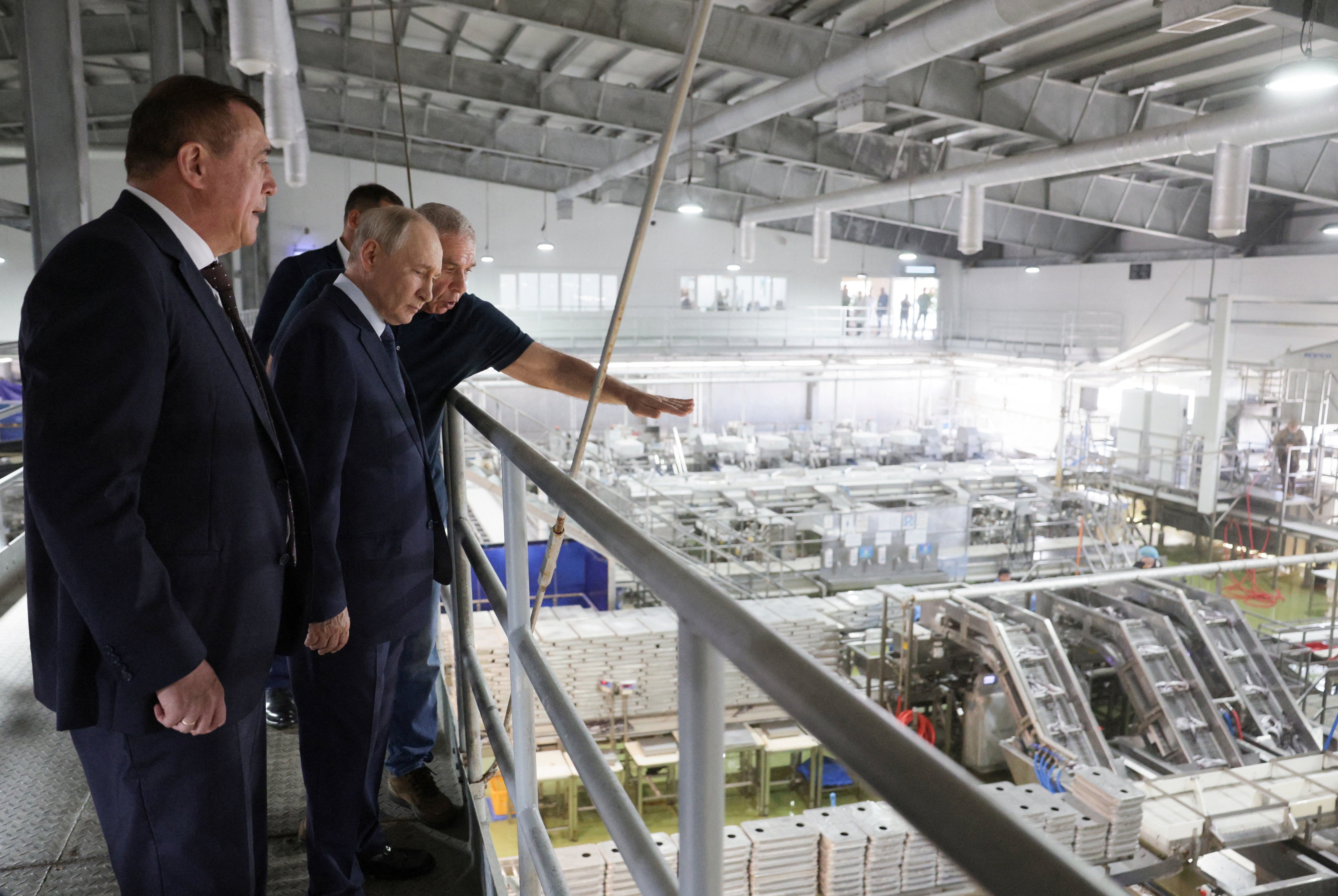 Vladimir Putin visits the Yasny fish-processing complex on the Kuril island of Iturup in the far eastern Sakhalin region of Russia on 13 August 2026