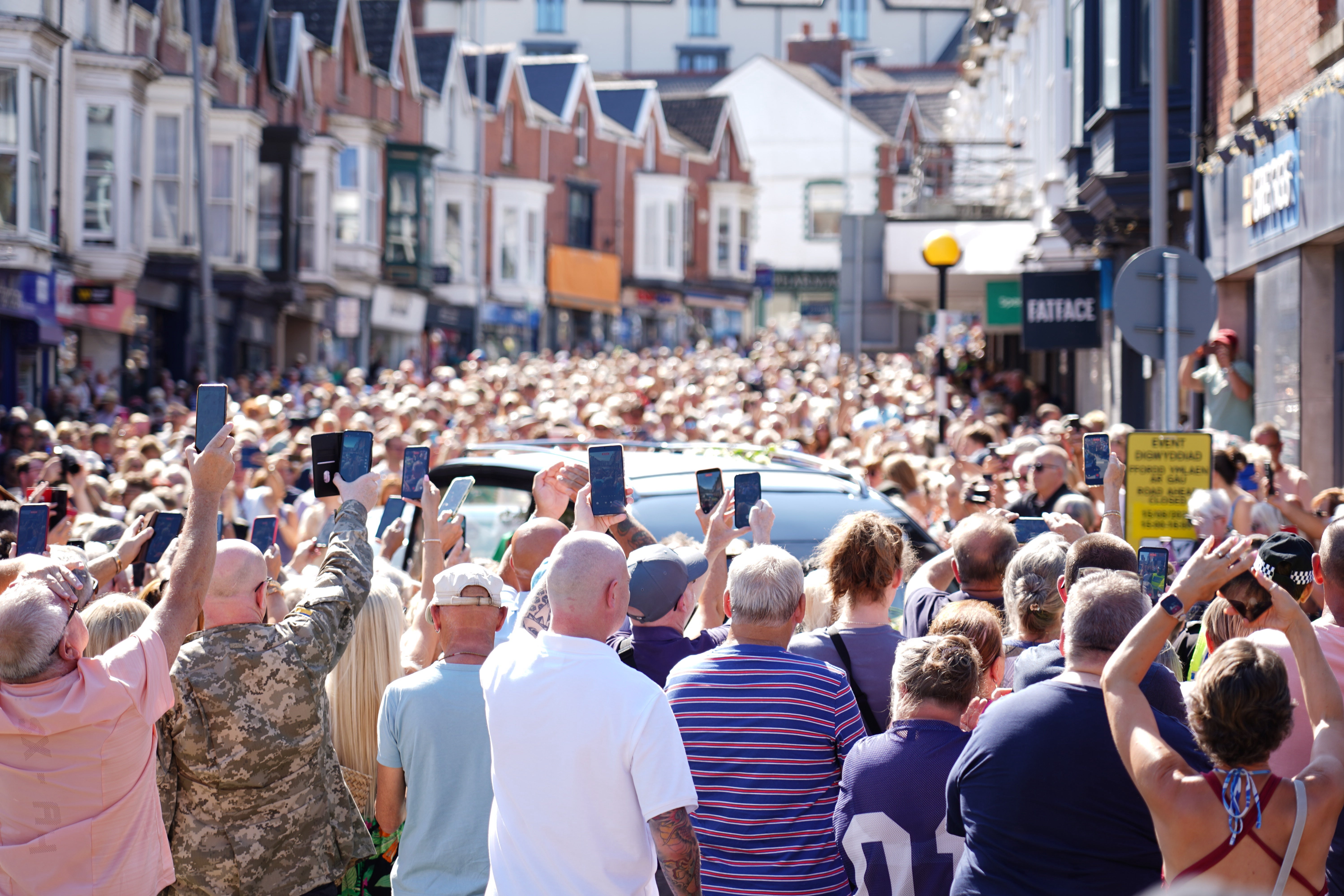 A throng of Bonnie Tyler fans in Newton Road in the Mumbles, Swansea (Zoe Head-Thomas/PA)