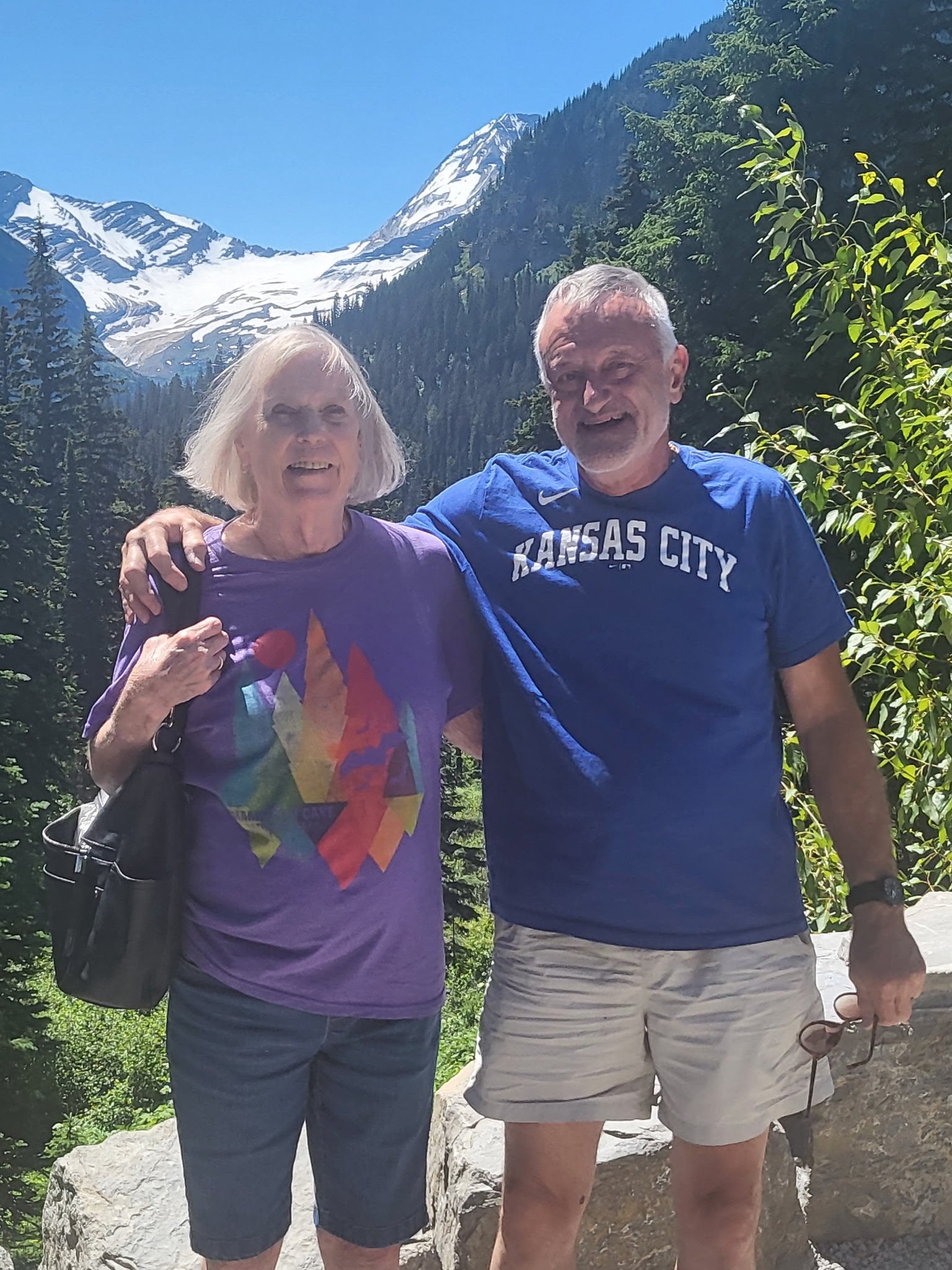 Chris Schowengerdt (left) was sitting next to her husband of 50 years, Rex Schowengerdt, (right) last month when a rock crashed through the roof of a Jeep they were riding in while visiting Glacier National Park in Montana