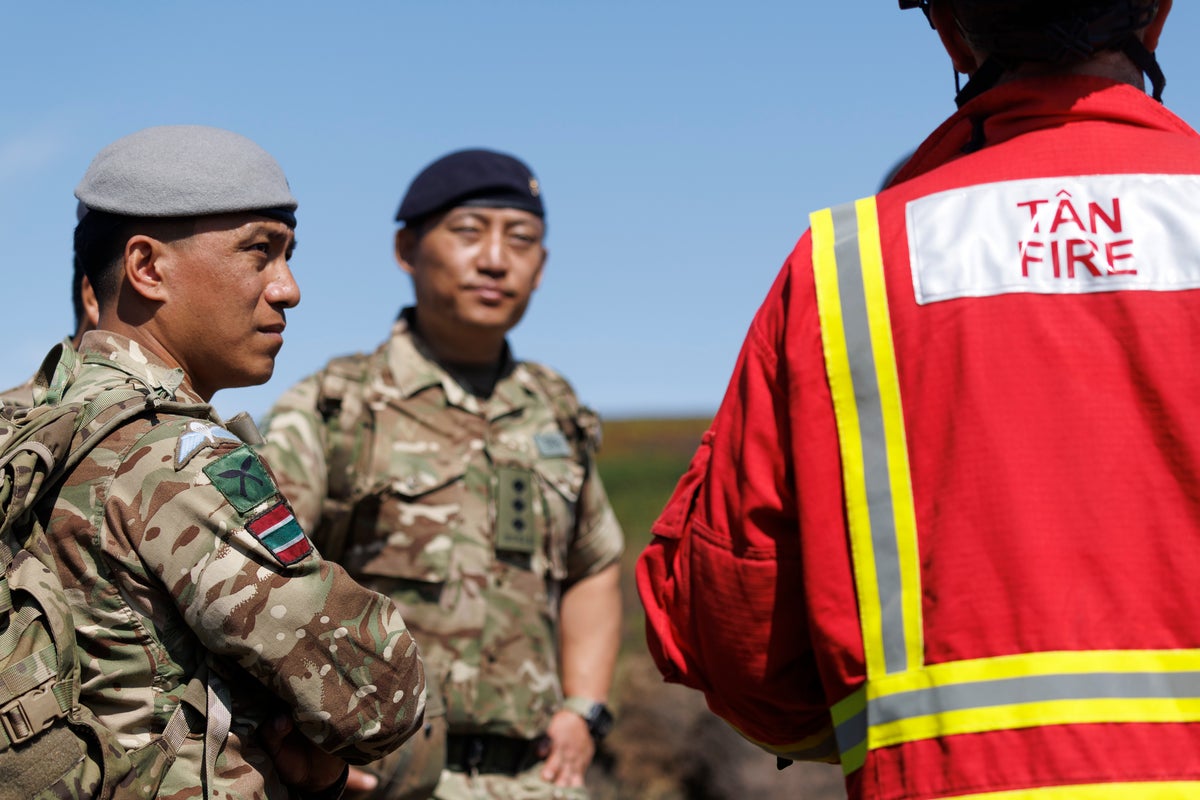 Gurkhas deployed to South Wales to help fight wildfires Gurkhas deployed to South Wales to help fight wildfires