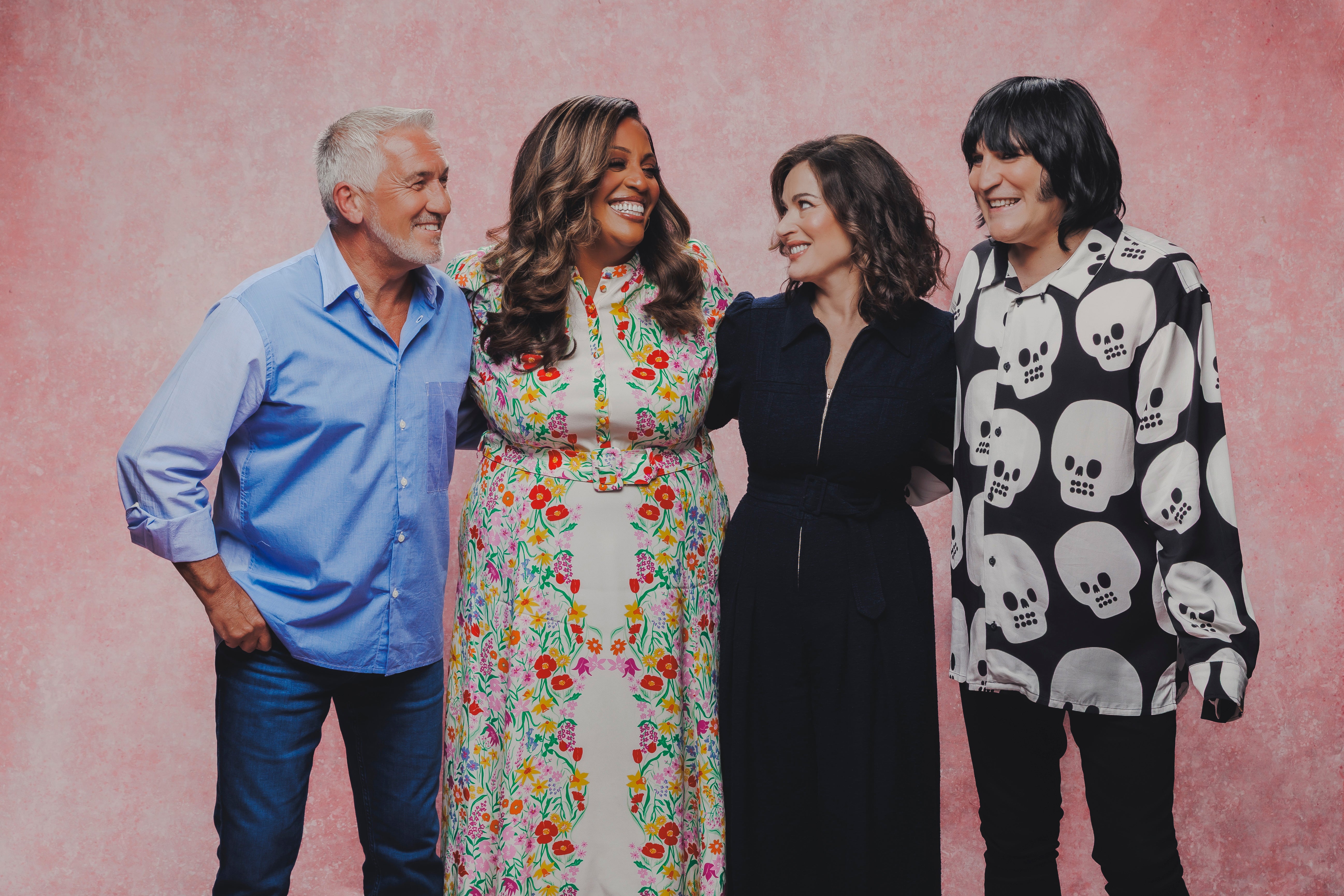 Nigella Lawson smiles as she embraces Great British Bake Off co-stars for first time