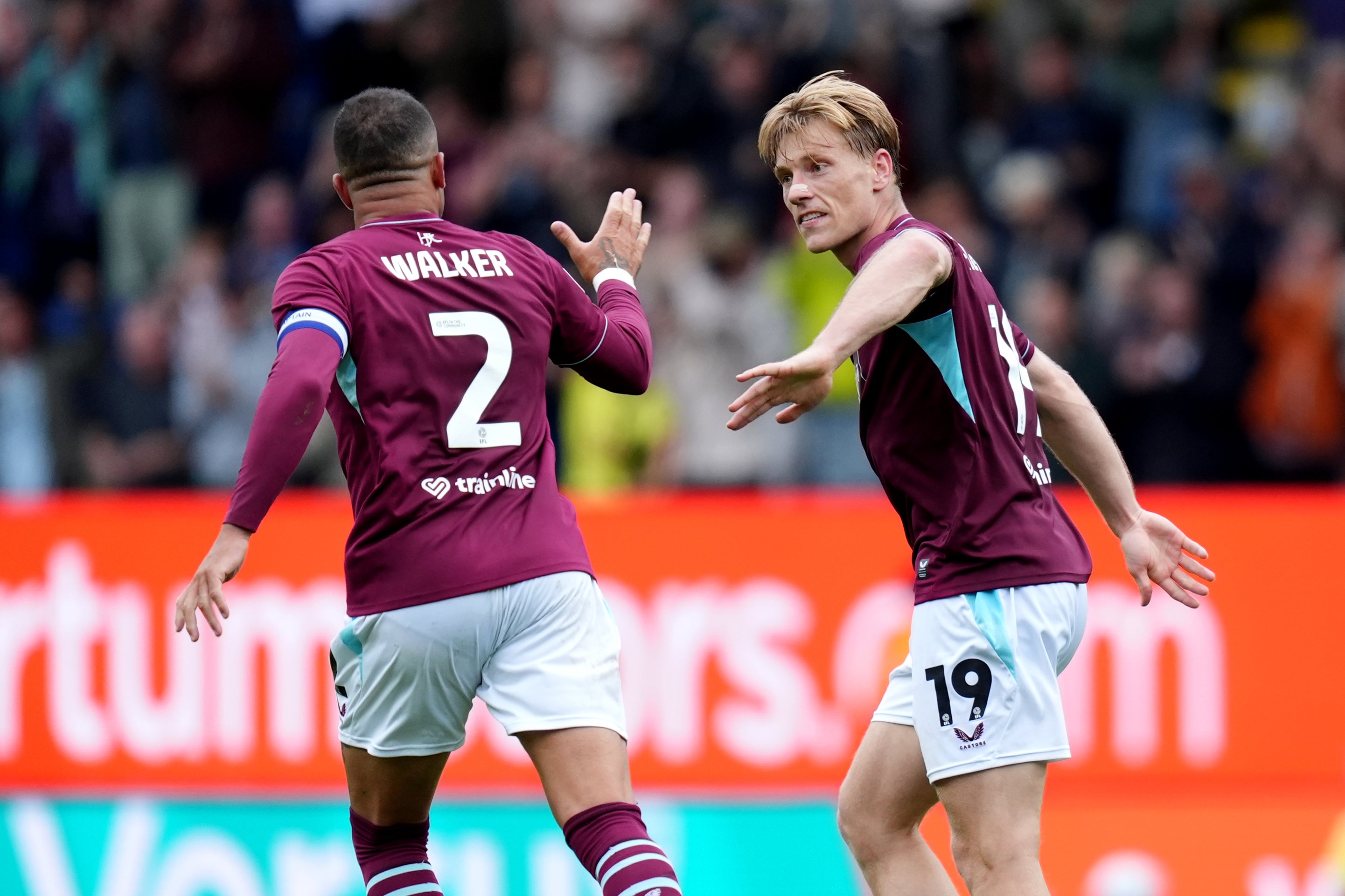 Burnley came from behind to draw with West Ham in the first match of their Championship campaign