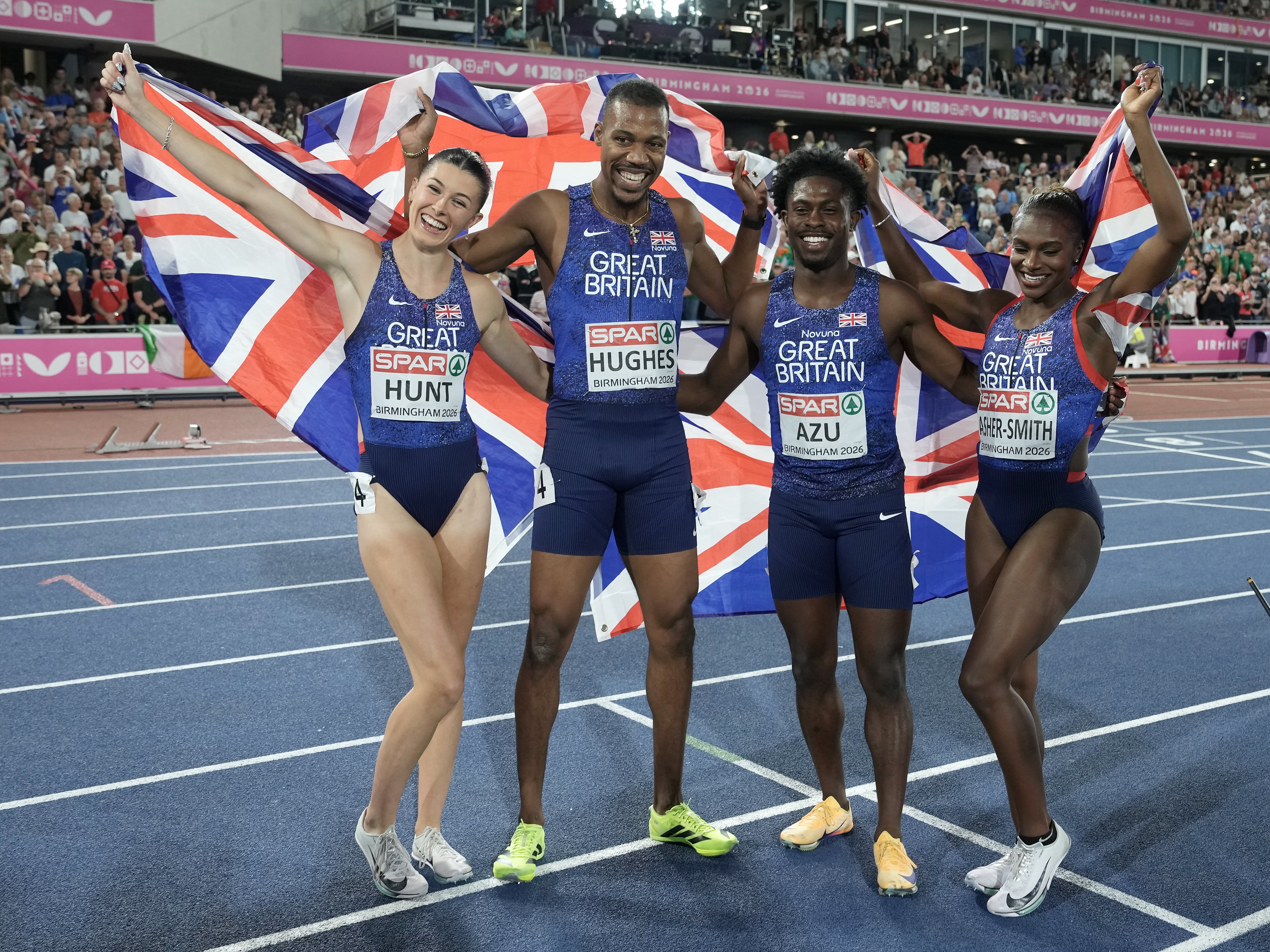 Hunt, Hughes, Azu and Asher-Smith celebrate their win