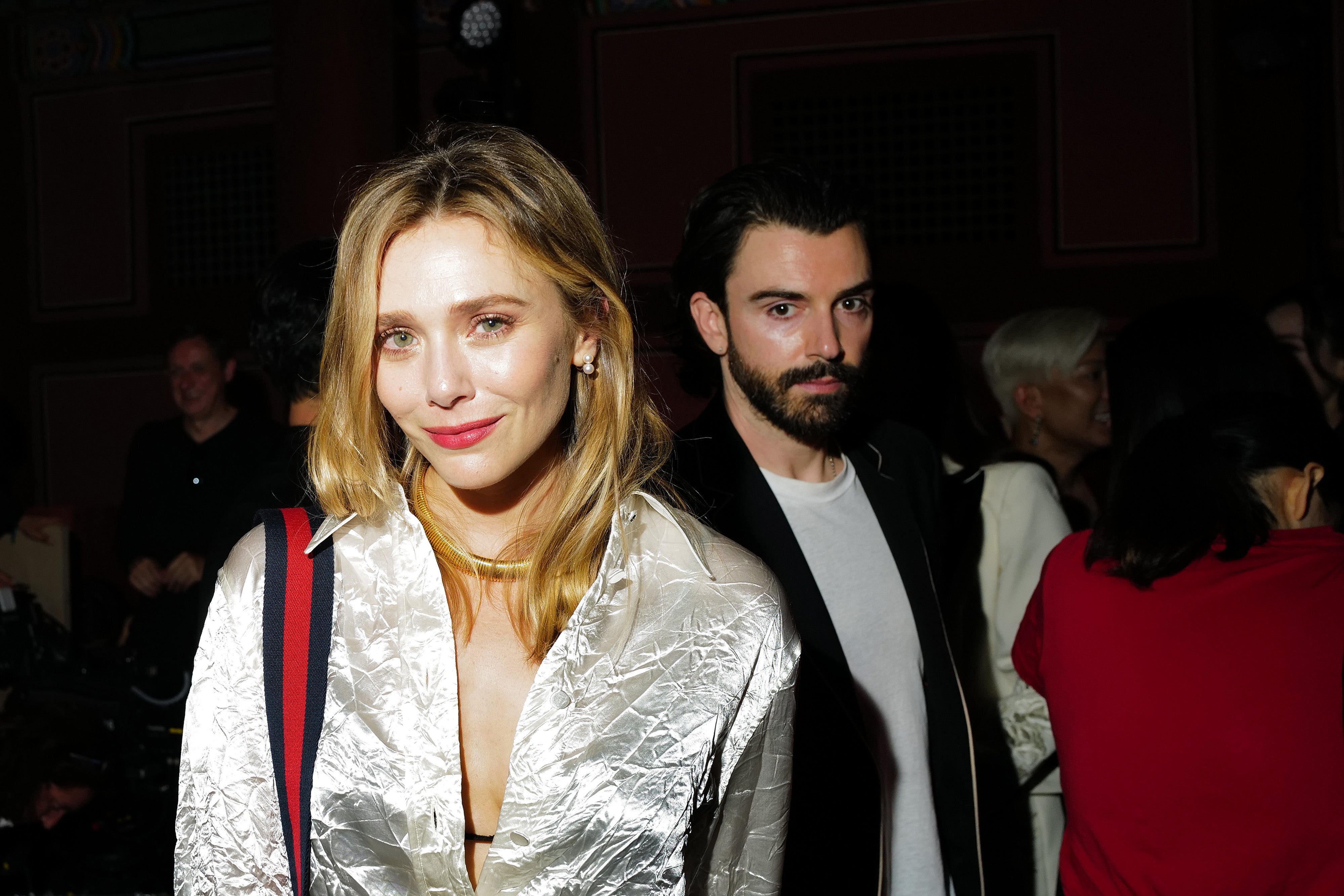 Elizabeth Olsen and her husband Robbie Arnett, pictured in 2023, have reportedly welcomed their first child