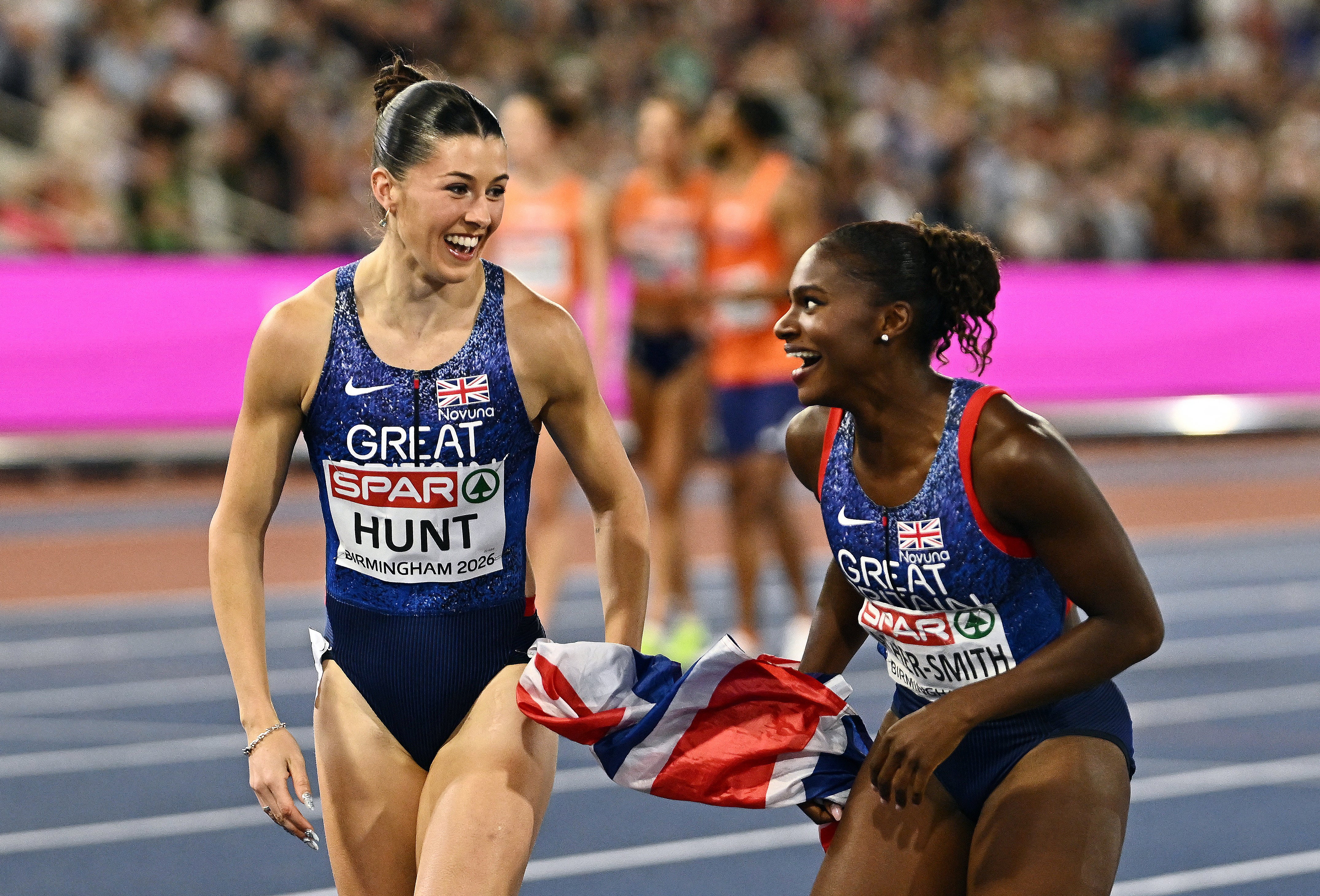 Amy Hunt and Dina Asher-Smith enjoy their victory