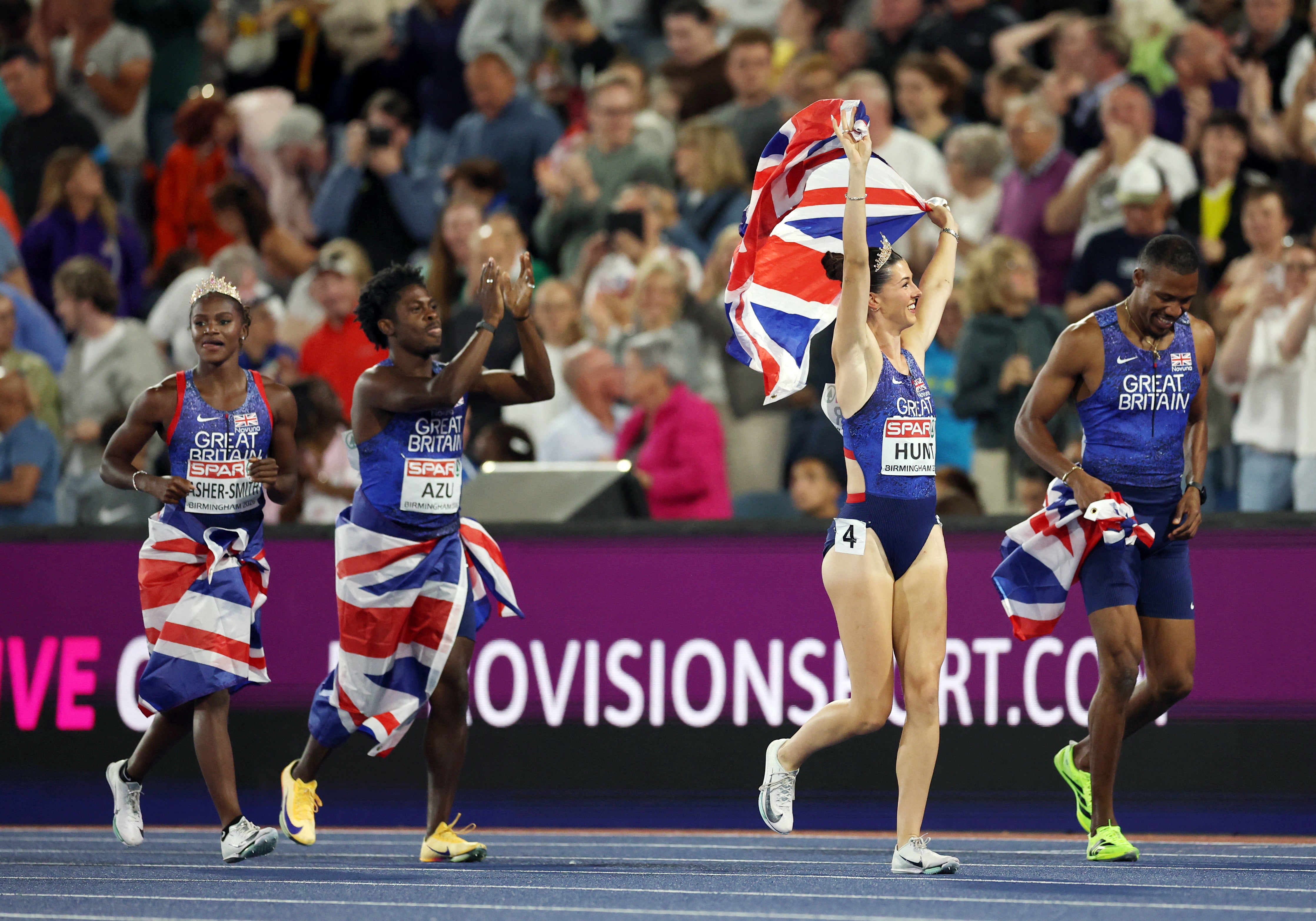 The British quartet celebrate after victory in Birmingham